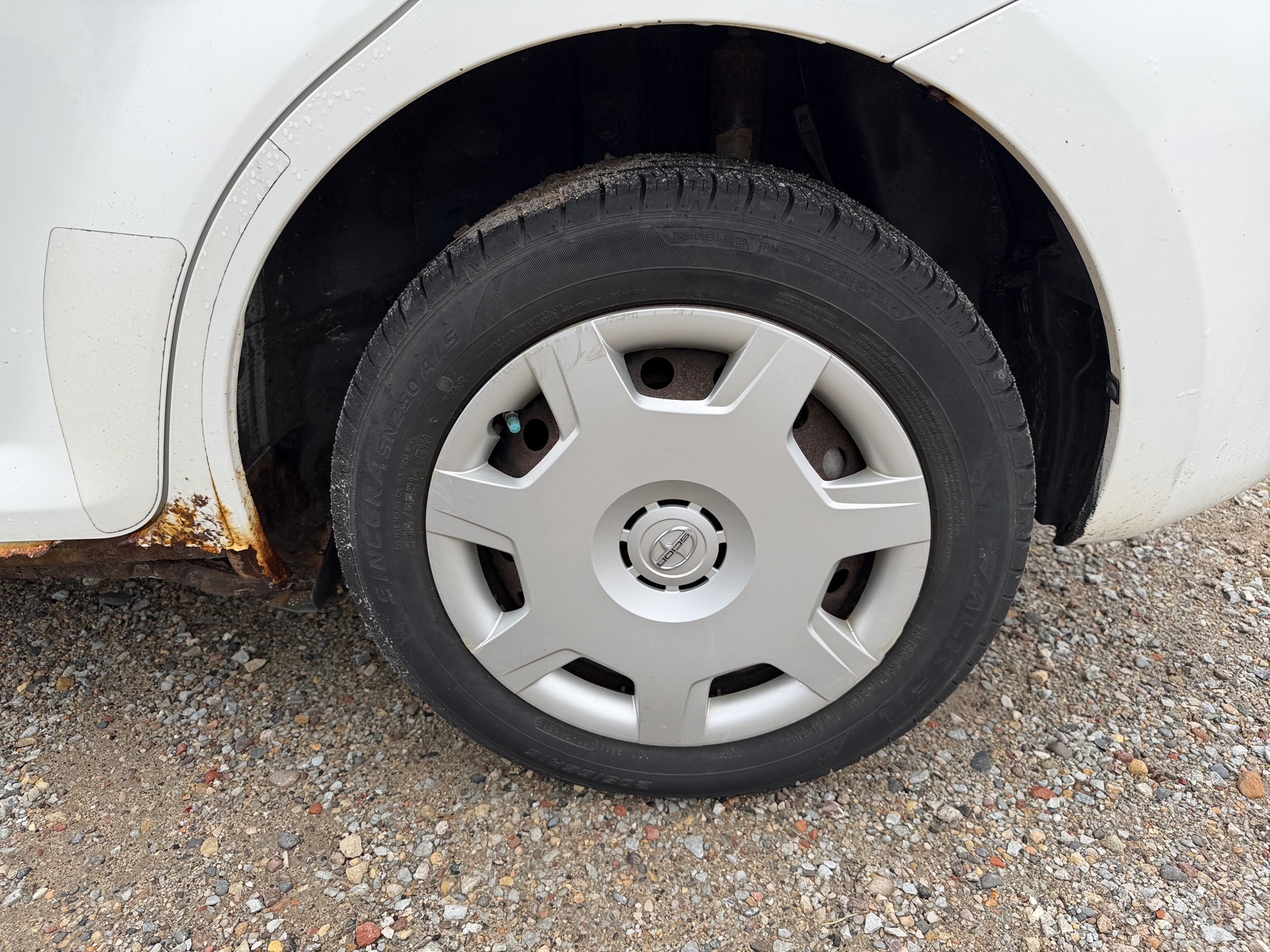 2010 scion xb 5-door-wagon-5-spd-mt with 219543 miles for sale near Elk River, Minnesota 106606_13_rear_drv_wheel.jpg