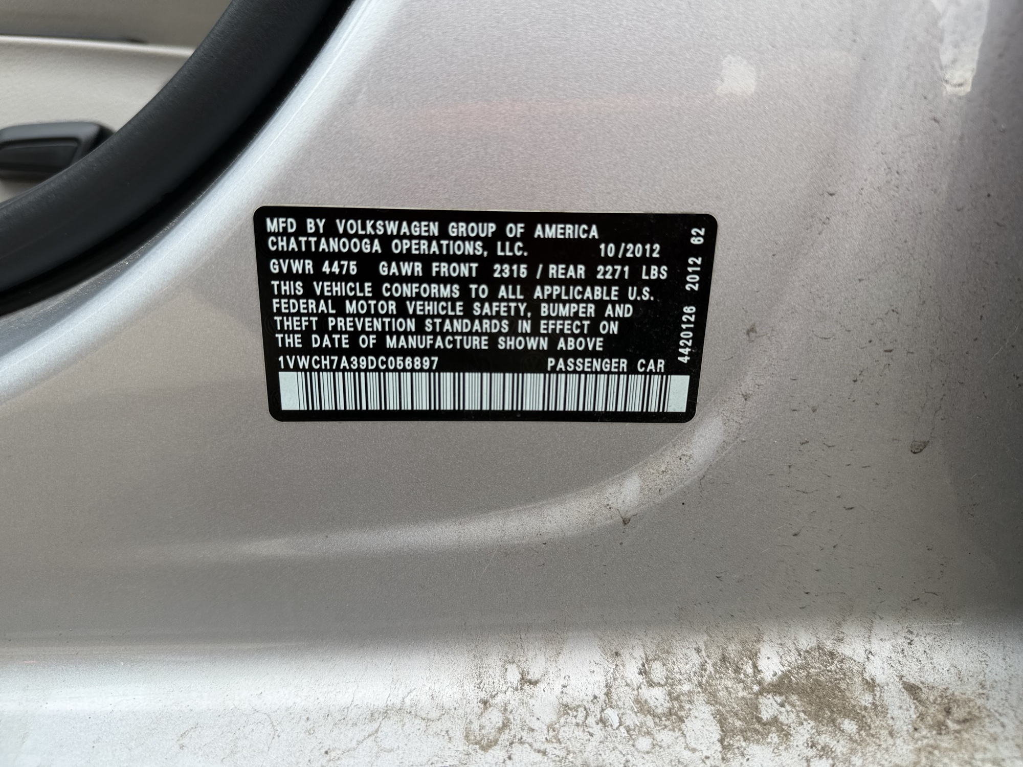 2013 volkswagen passat 2.5l-sel with 160900 miles for sale near Elk River, Minnesota 106607_47_door_vin_sticker.jpg