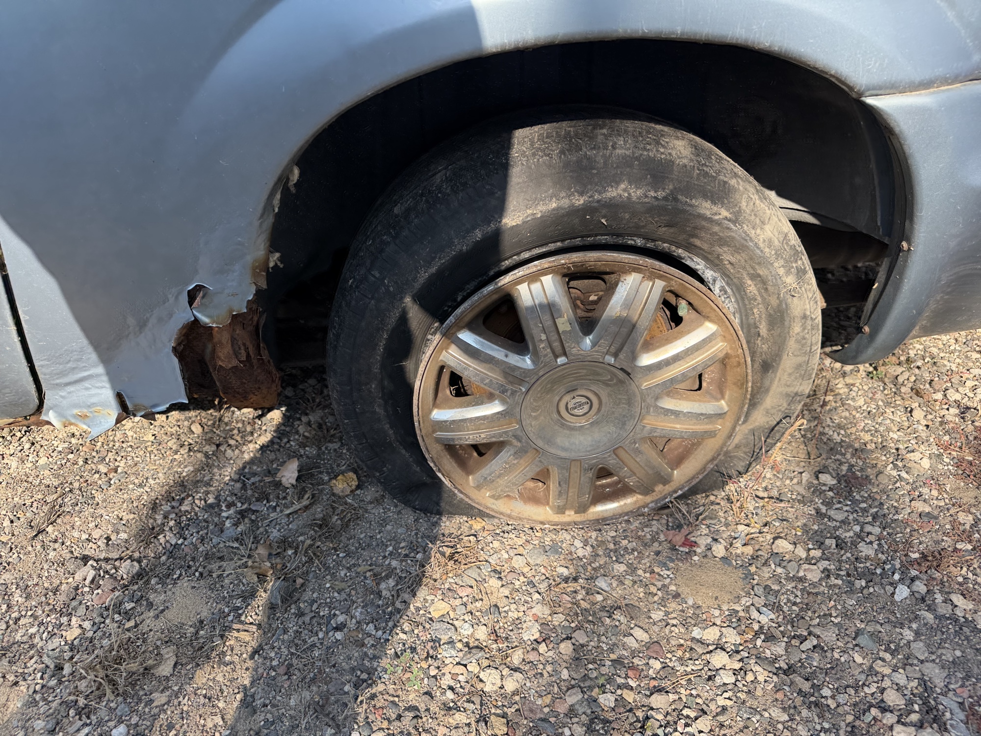 2005 dodge grand-caravan sxt for sale near Elk River, Minnesota 106611_13_rear_drv_wheel.jpg