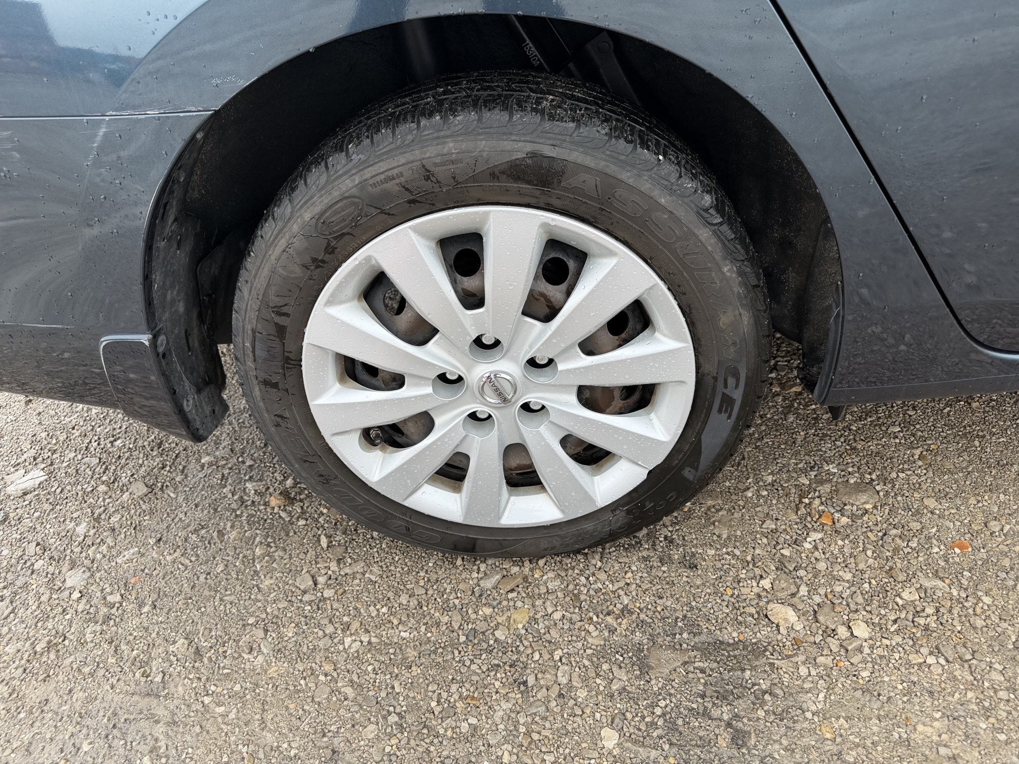 2015 nissan sentra s-6mt with 70790 miles for sale near St. Louis, Missouri 106617_14_rear_pass_wheel.jpg