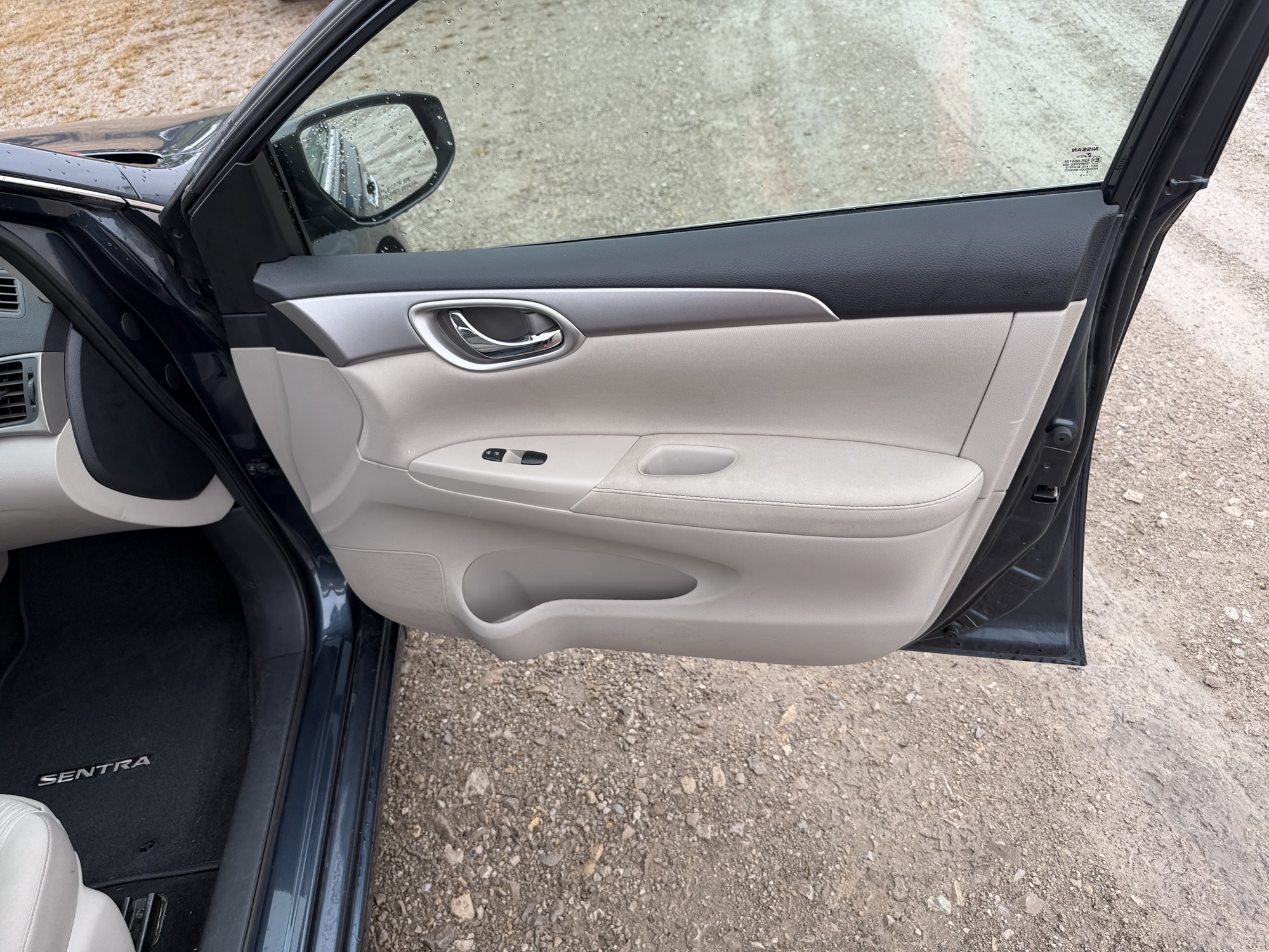 2015 nissan sentra s-6mt with 70790 miles for sale near St. Louis, Missouri 106617_32_passenger_door_panel.jpg