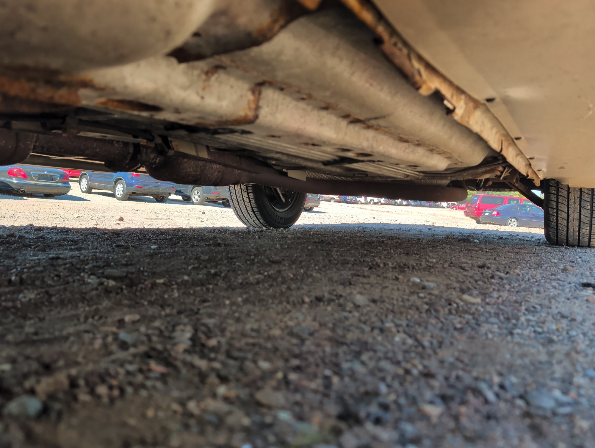 2004 pontiac grand-am se1-sedan with 91565 miles for sale near Elk River, Minnesota 106619_17_undercar_drv_side.jpg
