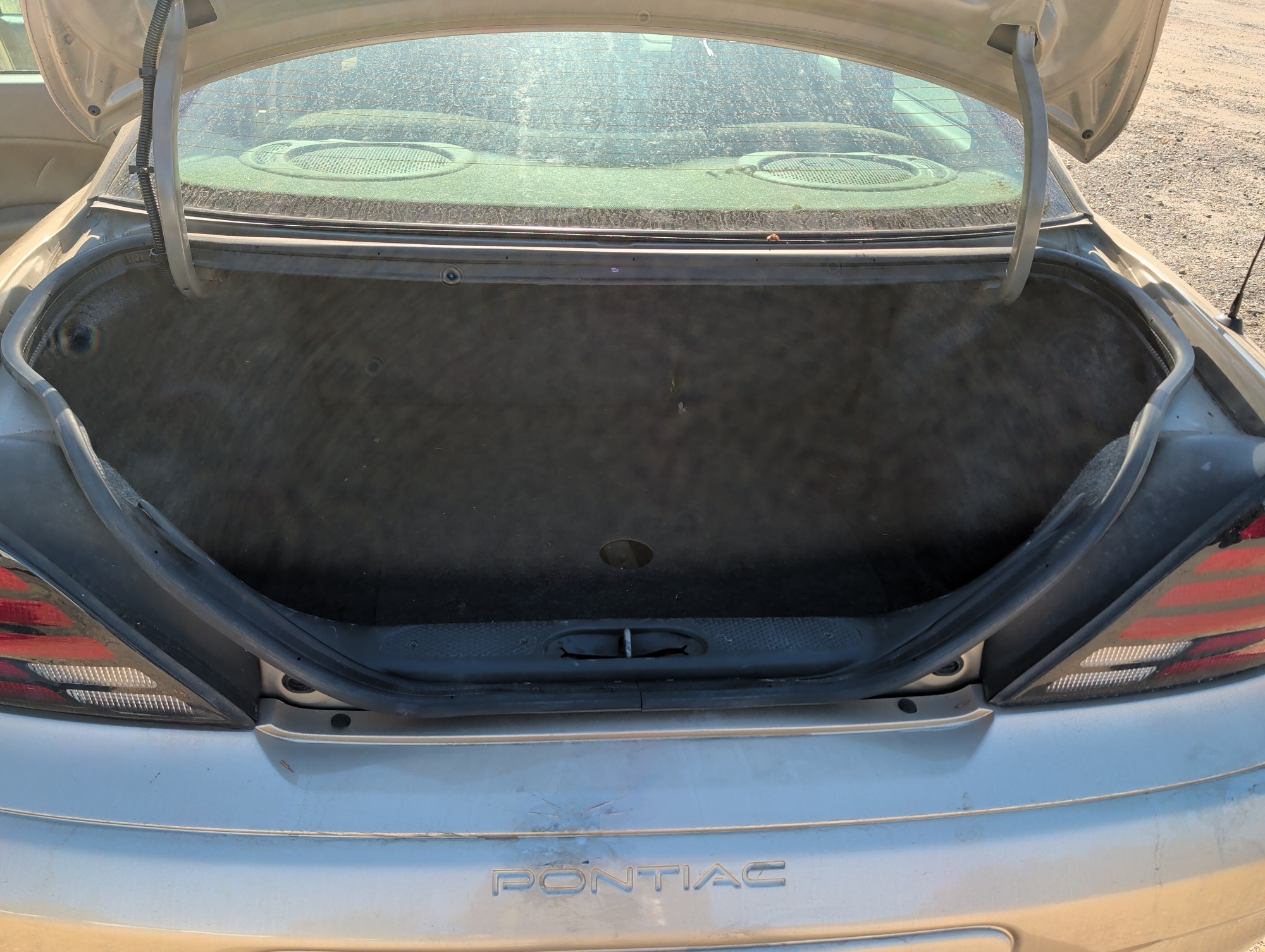 2004 pontiac grand-am se1-sedan with 91565 miles for sale near Elk River, Minnesota 106619_26_trunk.jpg