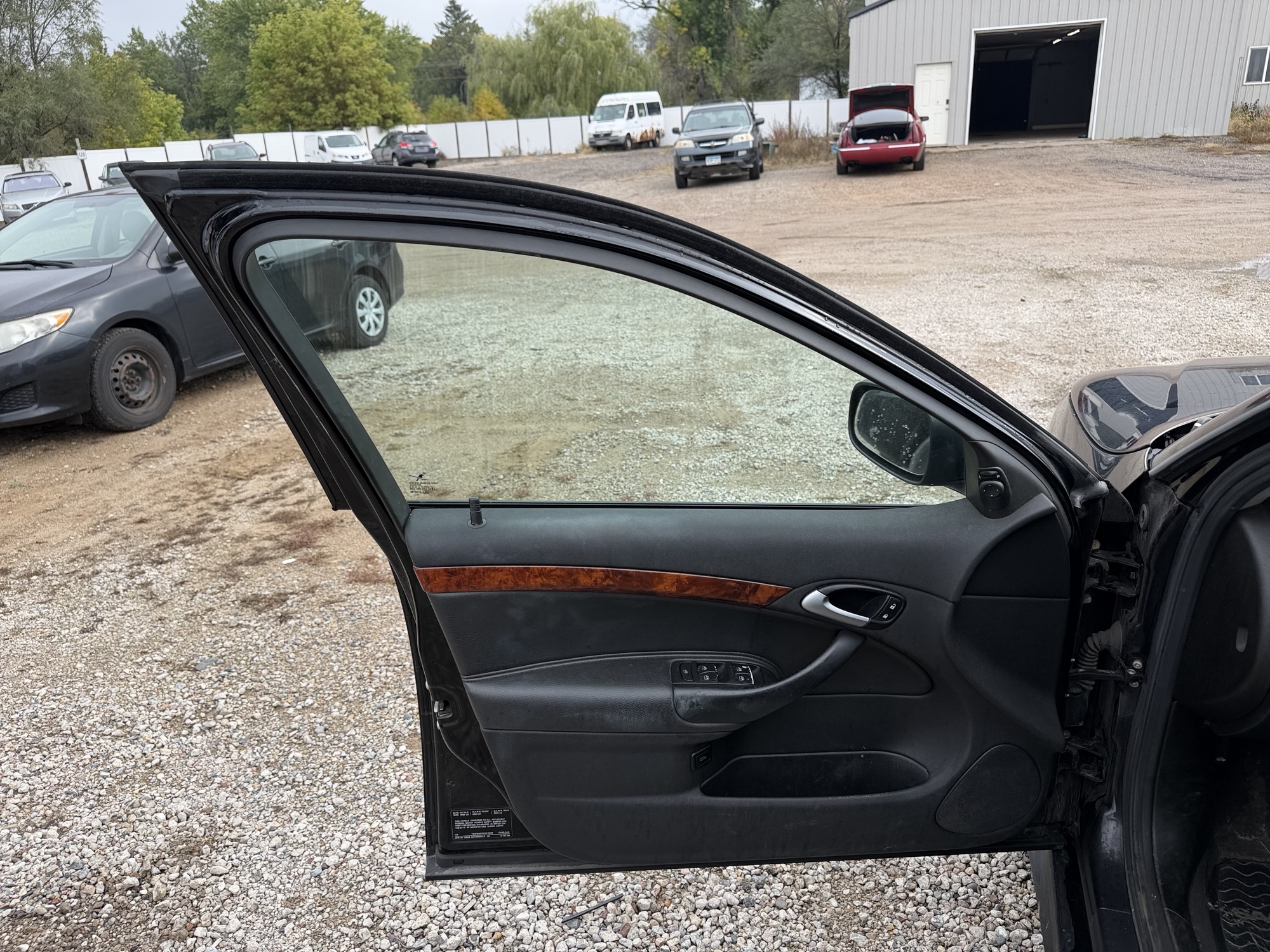 2009 saab 9-3 2.0t-touring with 207829 miles for sale near Elk River, Minnesota 106626_23_driver_door_panel.jpg