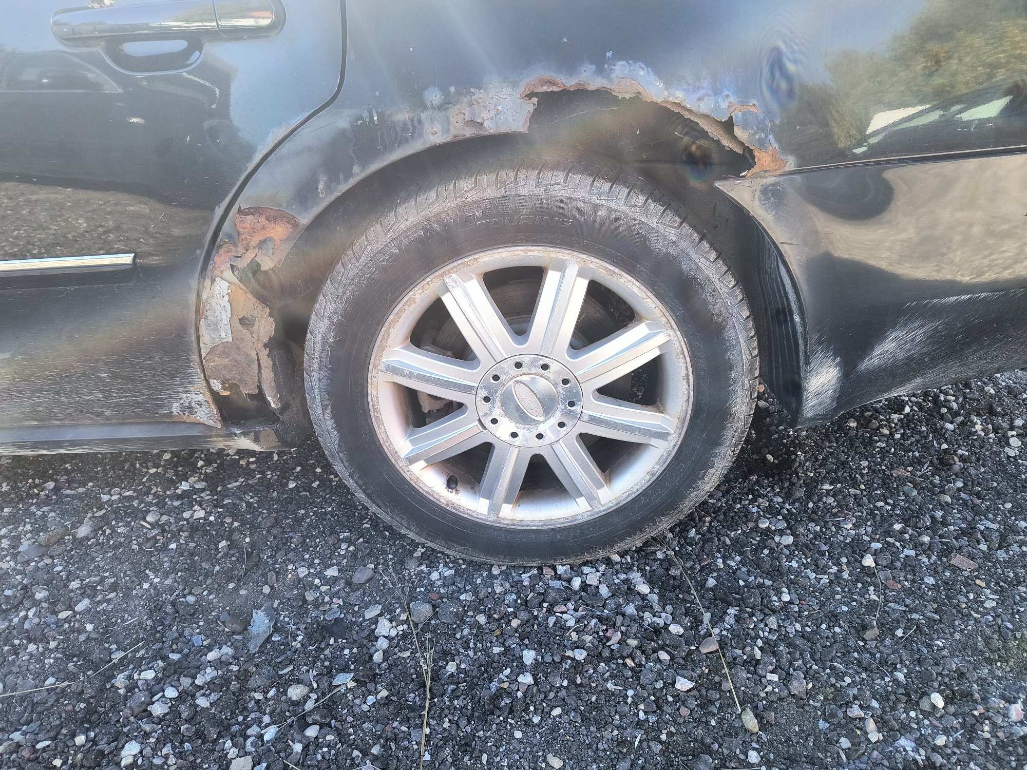 2005 ford five-hundred limited-awd for sale near Elk River, Minnesota 106629_13_rear_drv_wheel.jpg