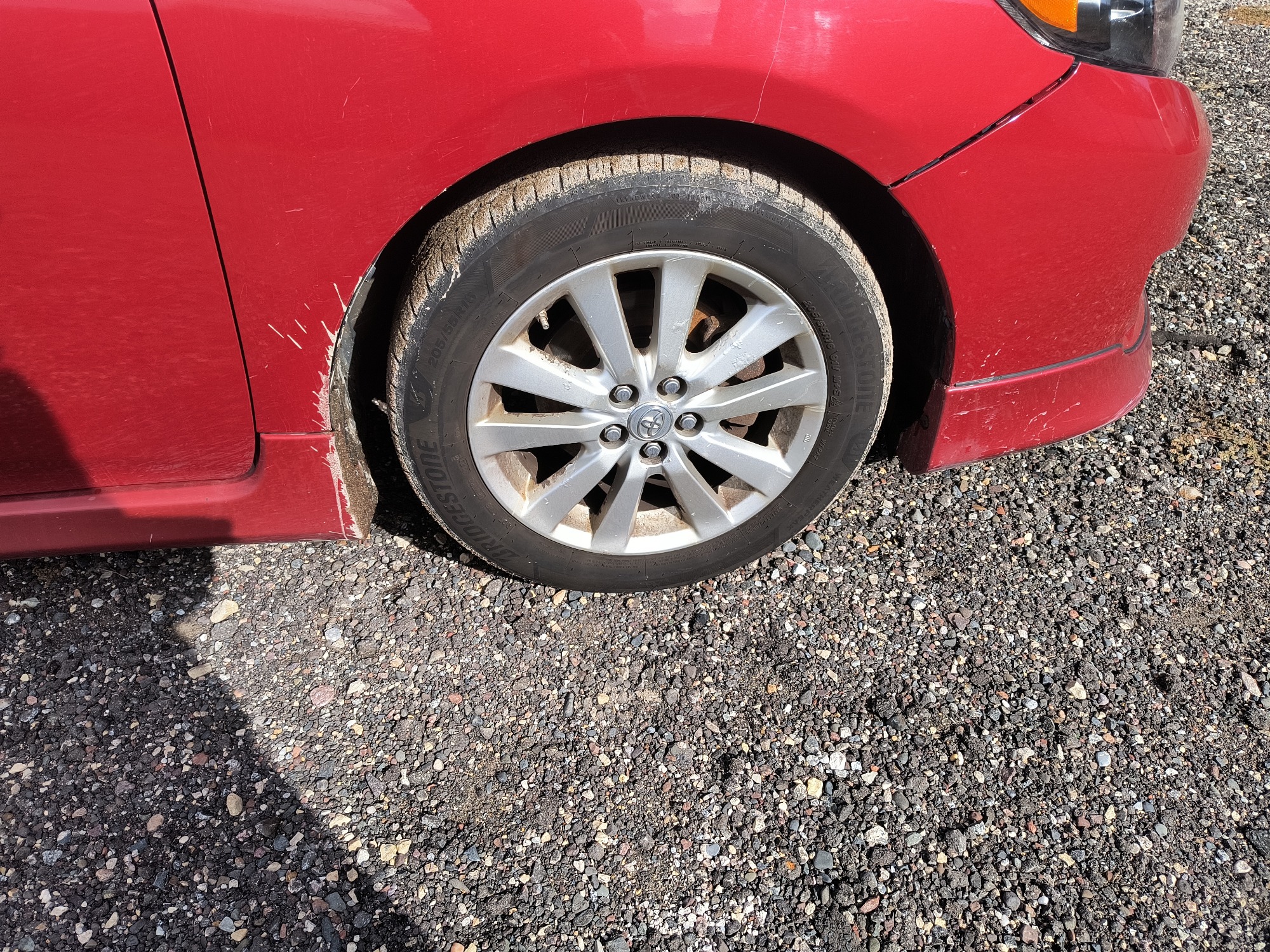 2009 toyota corolla base-4-speed-at with 195594 miles for sale near Elk River, Minnesota 106632_15_front_pass_wheel.jpg