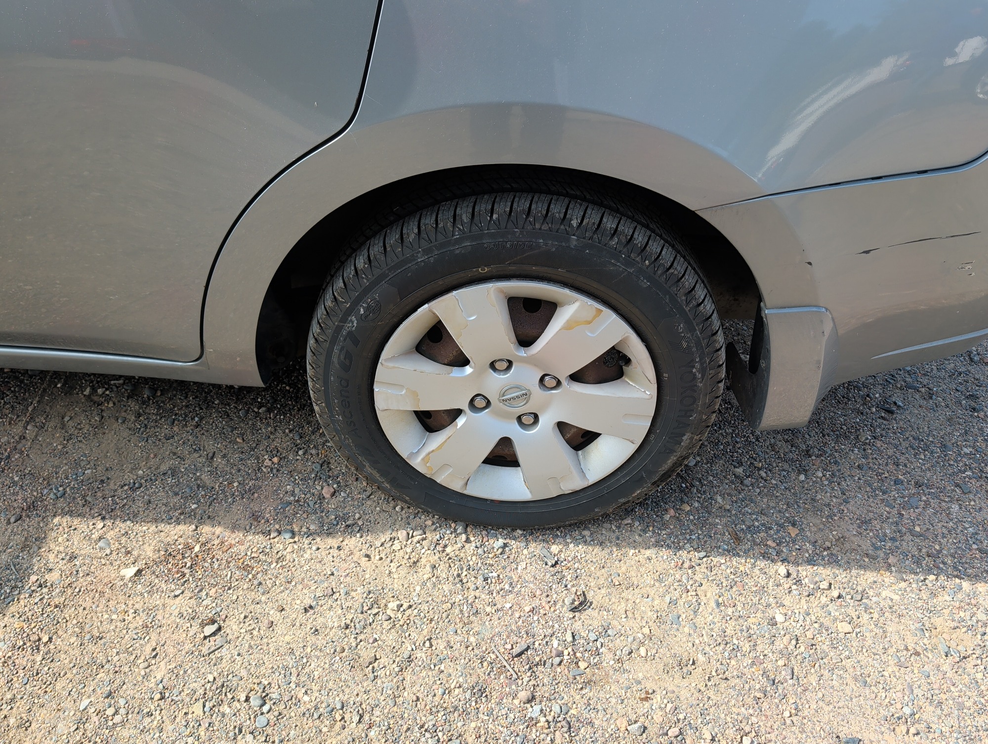 2011 nissan sentra 2.0 with 128752 miles for sale near Elk River, Minnesota 106636_13_rear_drv_wheel.jpg