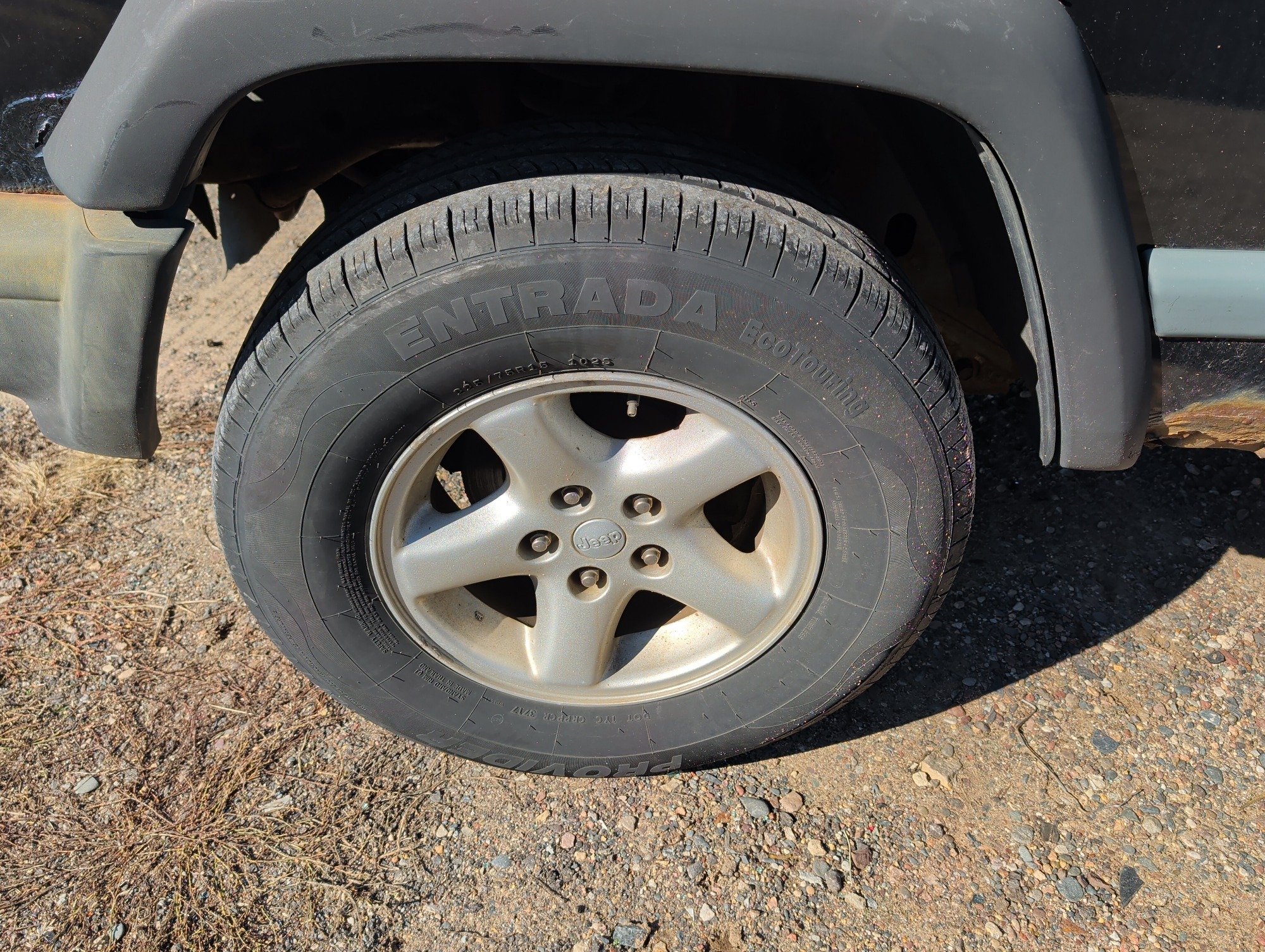 1998 jeep cherokee sport-4-door-4wd with 185611 miles for sale near Elk River, Minnesota 106637_12_drv_front_wheel.jpg