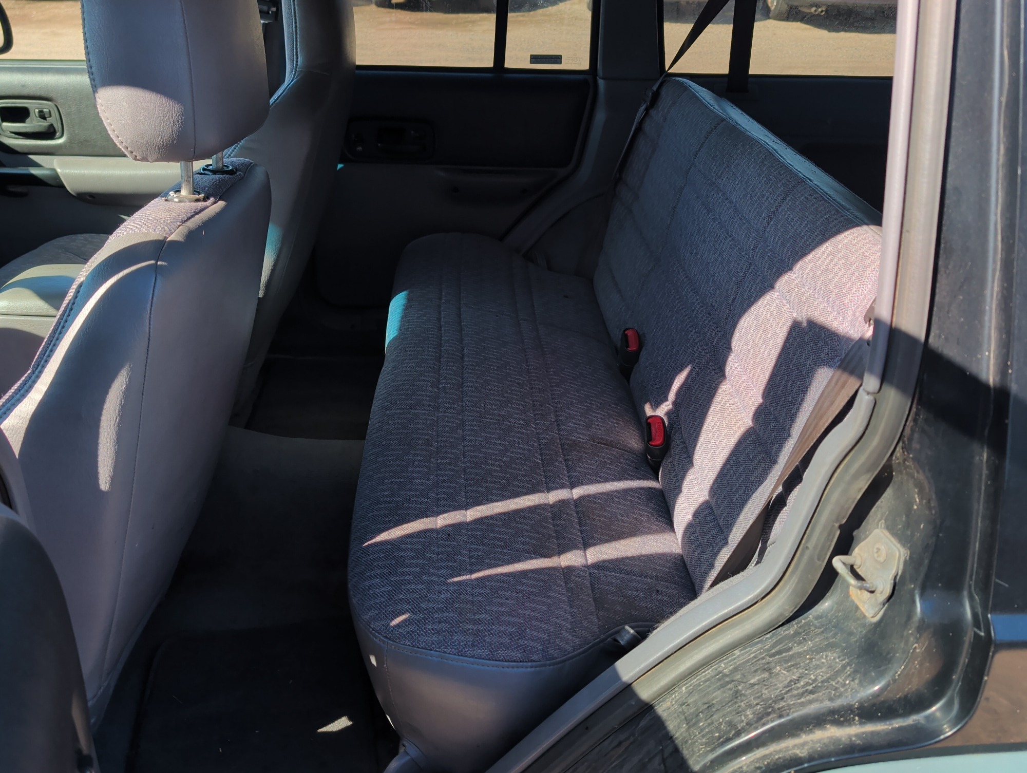 1998 jeep cherokee sport-4-door-4wd with 185611 miles for sale near Elk River, Minnesota 106637_24_drv_rear_seat.jpg