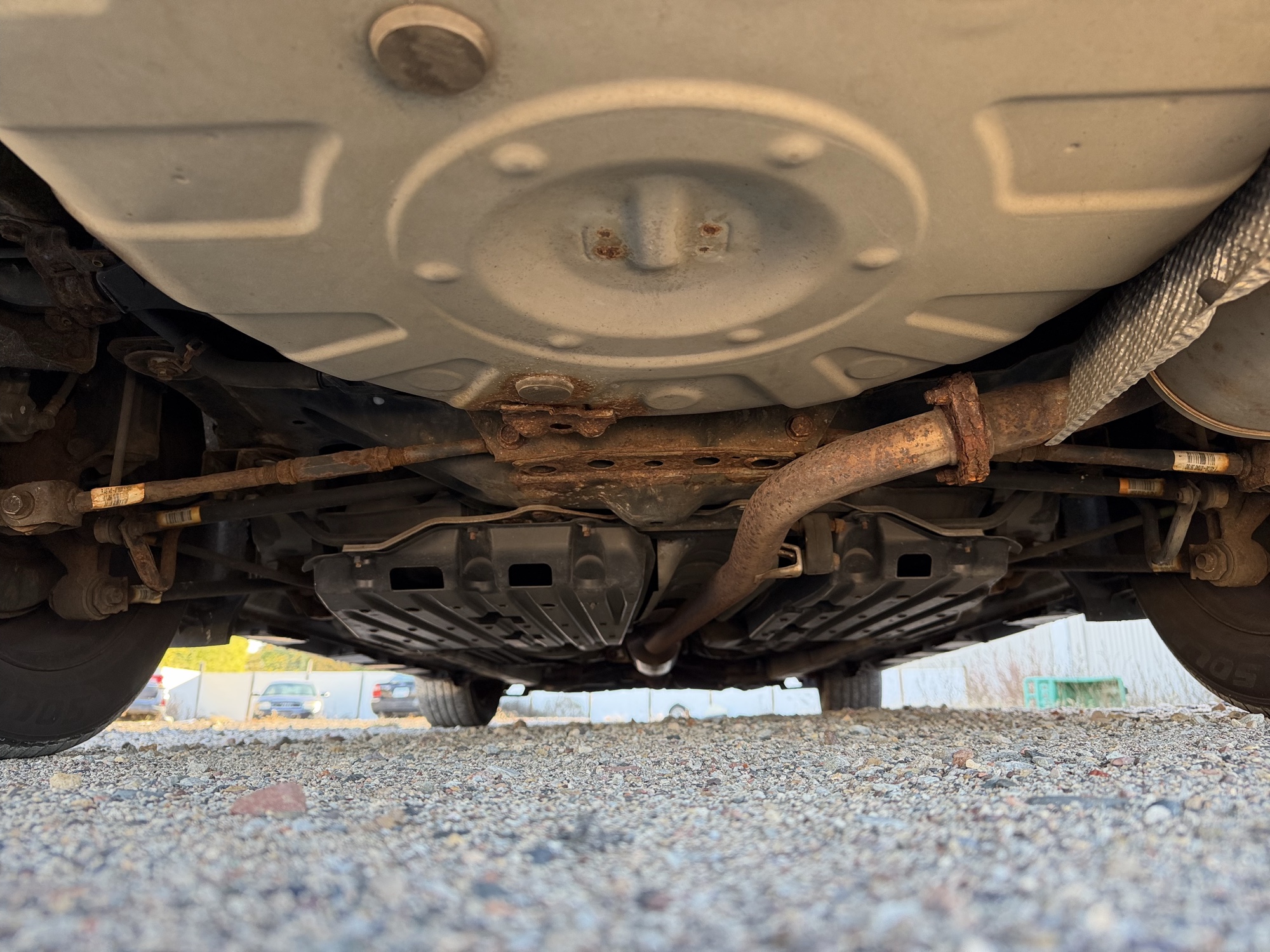 2011 toyota camry base-6-spd-at with 219492 miles for sale near Elk River, Minnesota 106639_19_undercar_rear.jpg