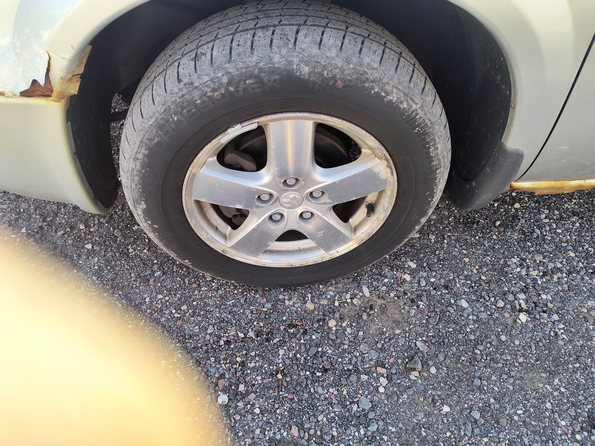 2005 dodge caravan sxt with 132608 miles for sale near Elk River, Minnesota 106640_12_drv_front_wheel.jpg