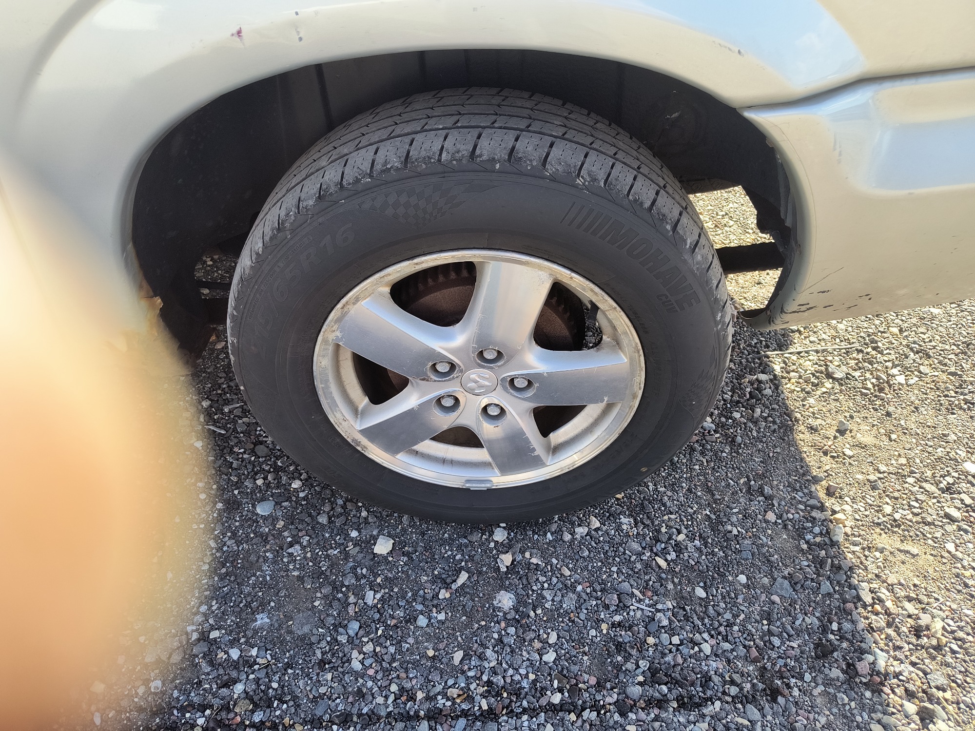 2005 dodge caravan sxt with 132608 miles for sale near Elk River, Minnesota 106640_13_rear_drv_wheel.jpg