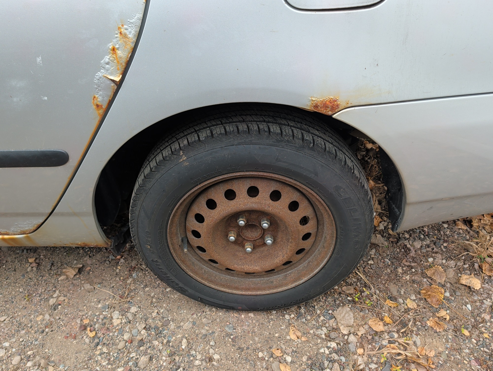 2007 toyota corolla ce with 173168 miles for sale near Elk River, Minnesota 106641_13_rear_drv_wheel.jpg