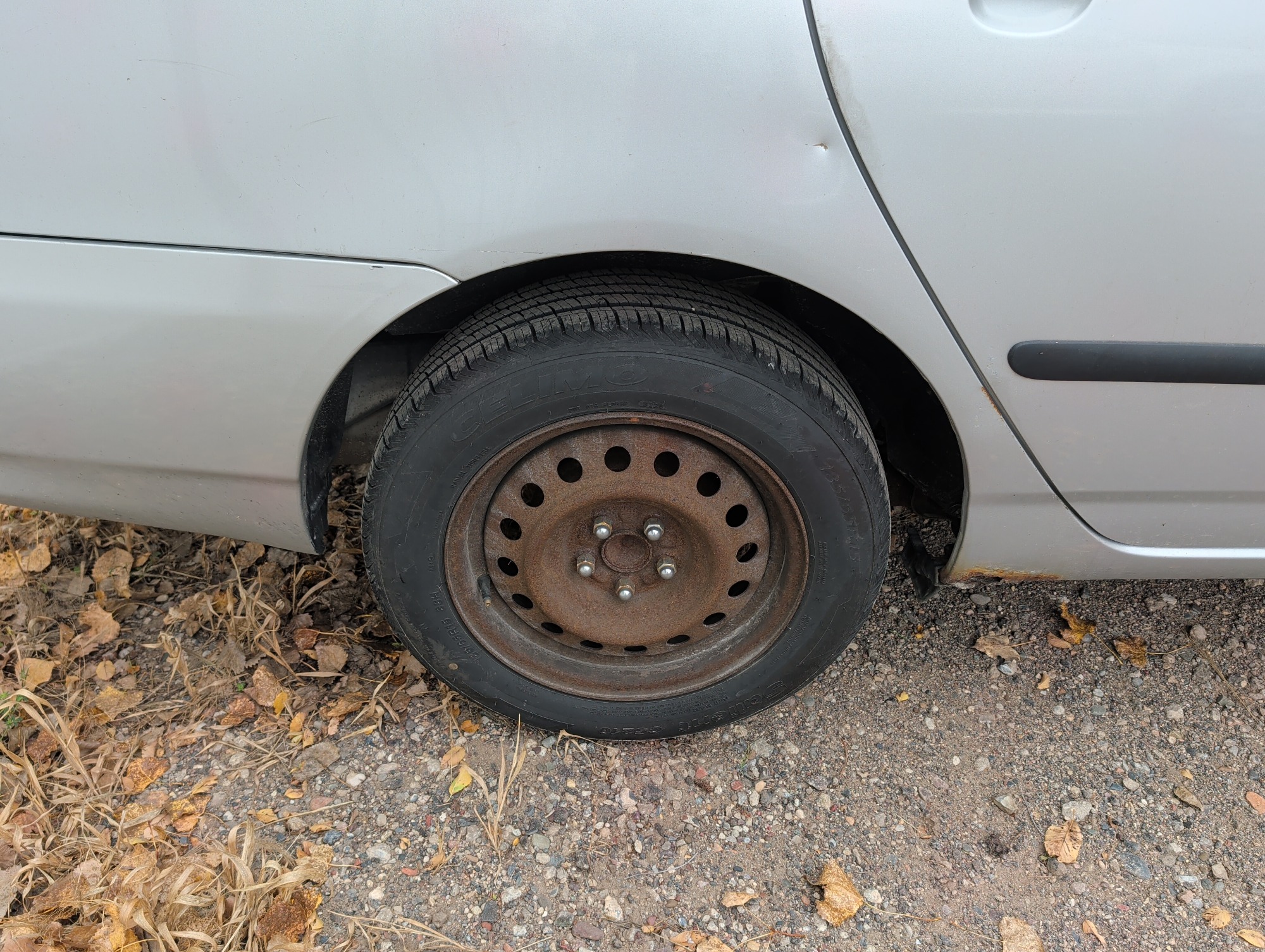 2007 toyota corolla ce with 173168 miles for sale near Elk River, Minnesota 106641_14_rear_pass_wheel.jpg