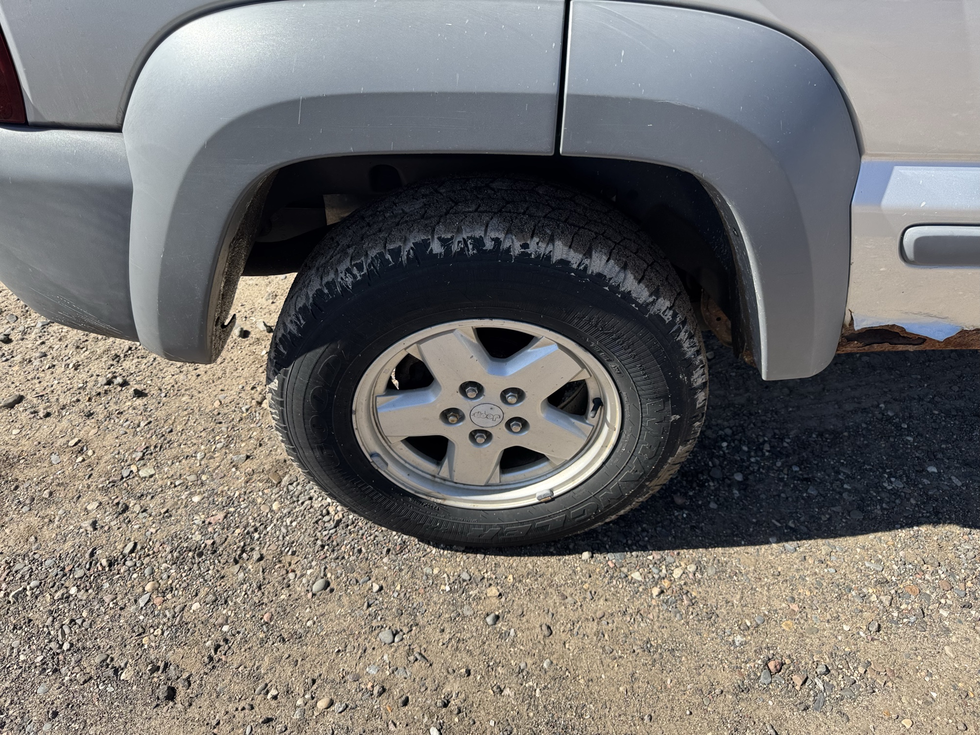2005 jeep liberty sport-4wd with 175646 miles for sale near Elk River, Minnesota 106643_14_rear_pass_wheel.jpg