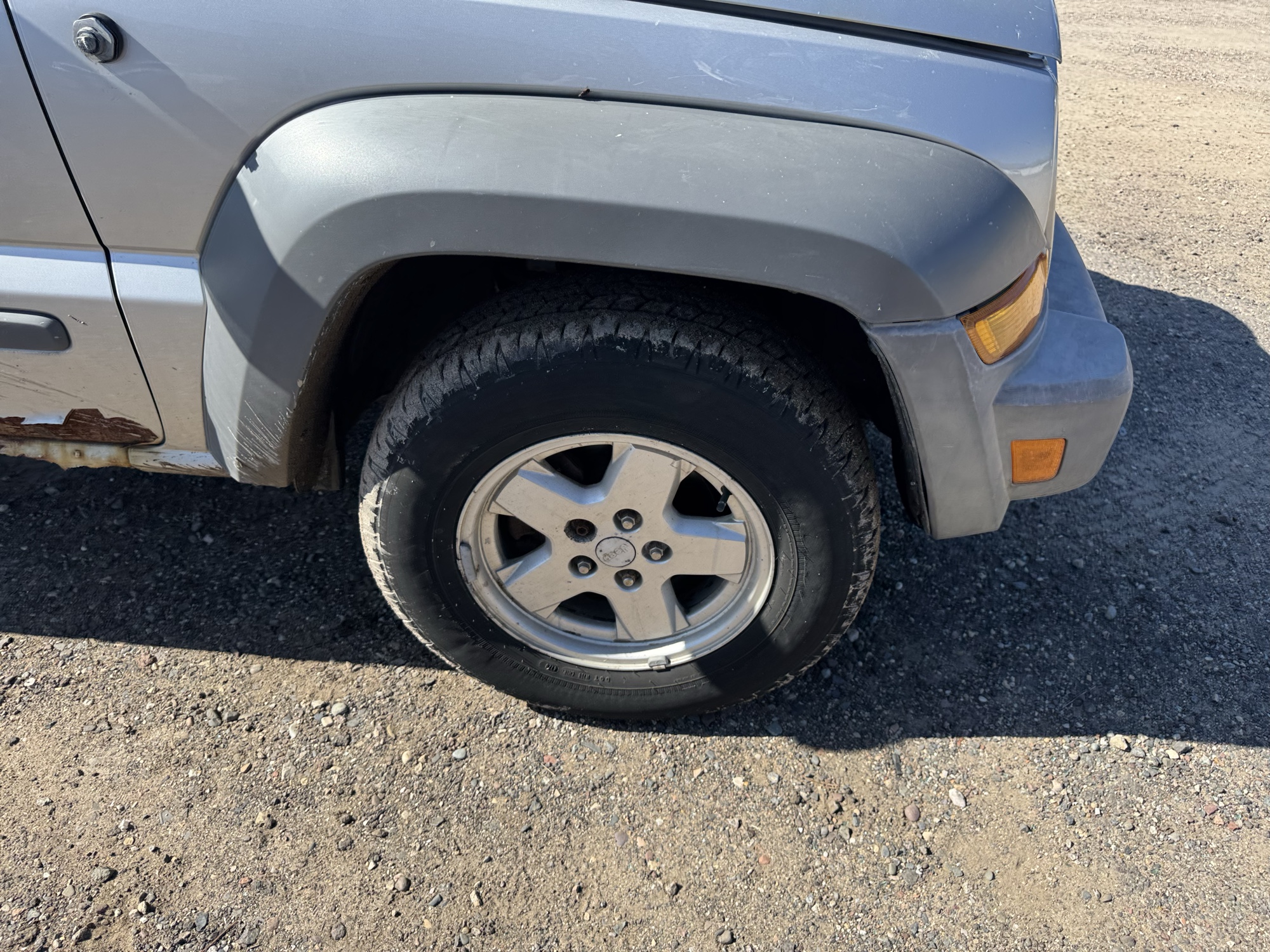 2005 jeep liberty sport-4wd with 175646 miles for sale near Elk River, Minnesota 106643_15_front_pass_wheel.jpg