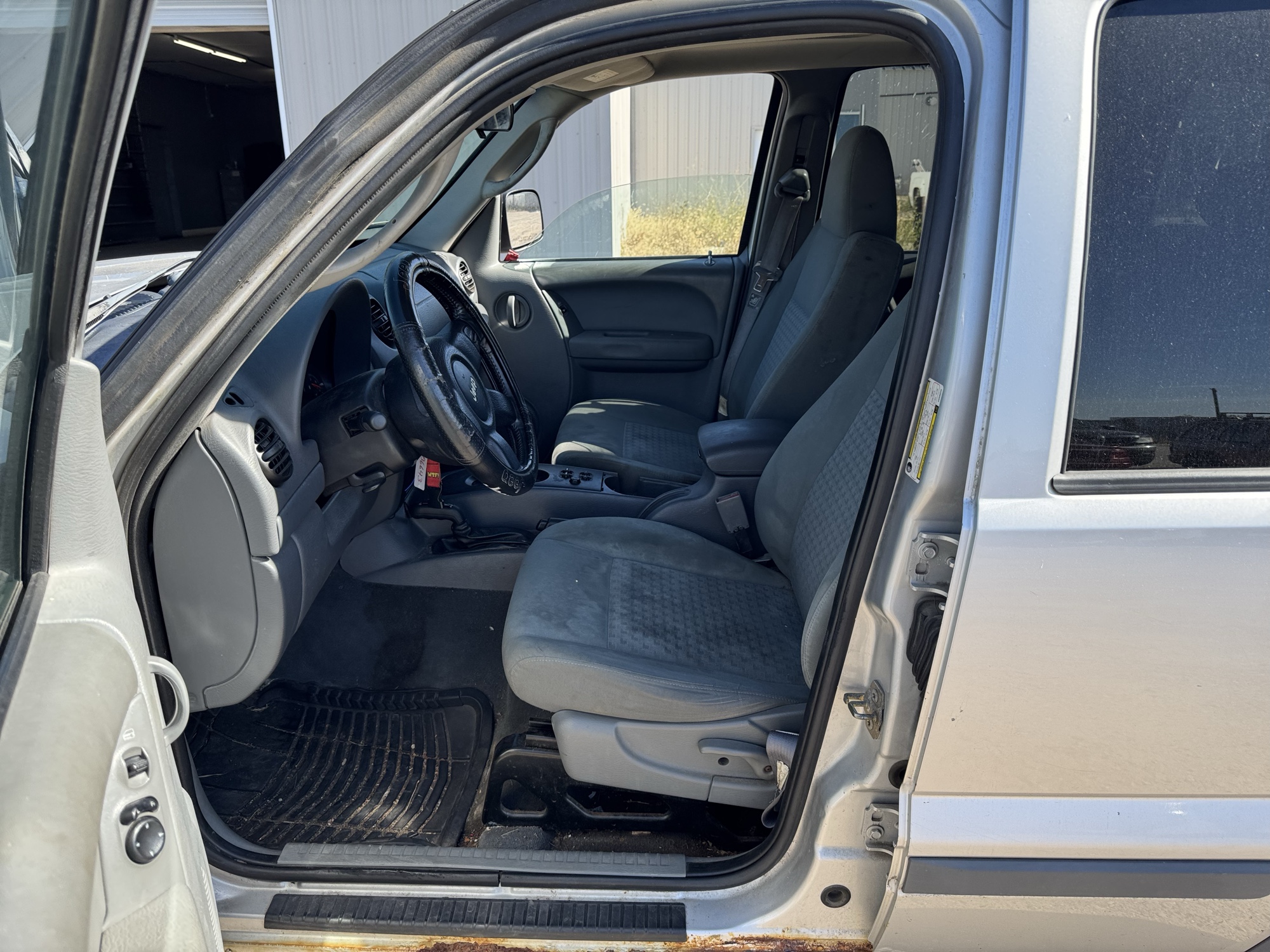 2005 jeep liberty sport-4wd with 175646 miles for sale near Elk River, Minnesota 106643_22_driver_seat.jpg