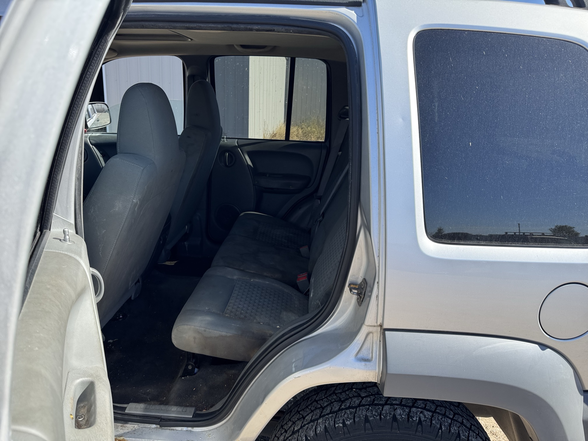 2005 jeep liberty sport-4wd with 175646 miles for sale near Elk River, Minnesota 106643_24_drv_rear_seat.jpg