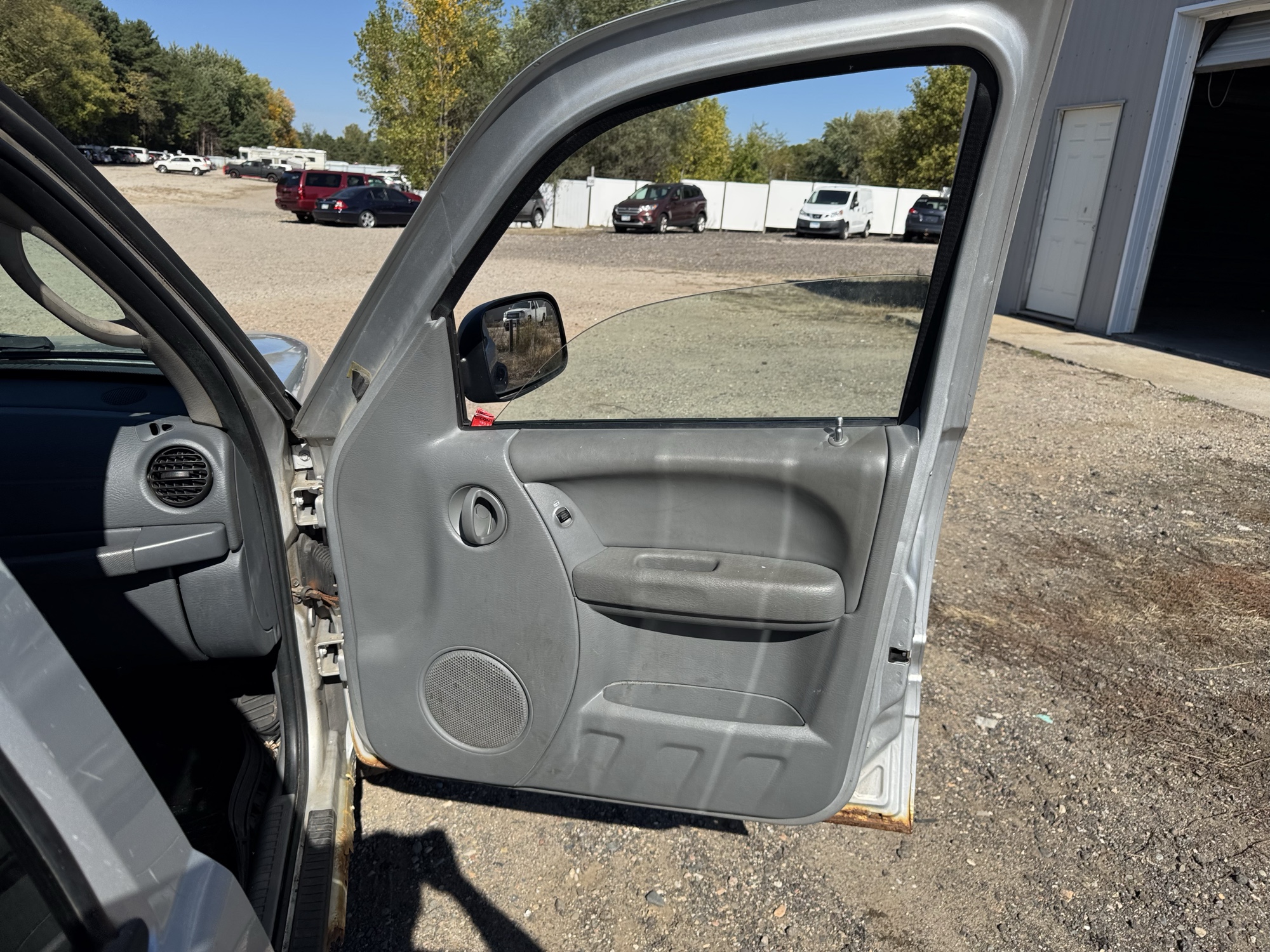 2005 jeep liberty sport-4wd with 175646 miles for sale near Elk River, Minnesota 106643_32_passenger_door_panel.jpg
