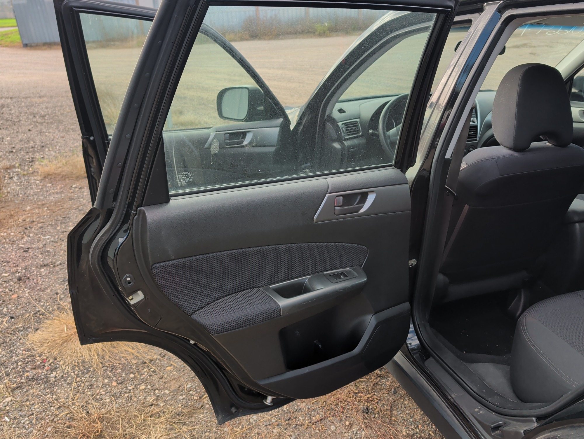 2011 subaru forester 2.5x-touring with 158569 miles for sale near Elk River, Minnesota 106647_25_drv_rear_door_panel.jpg