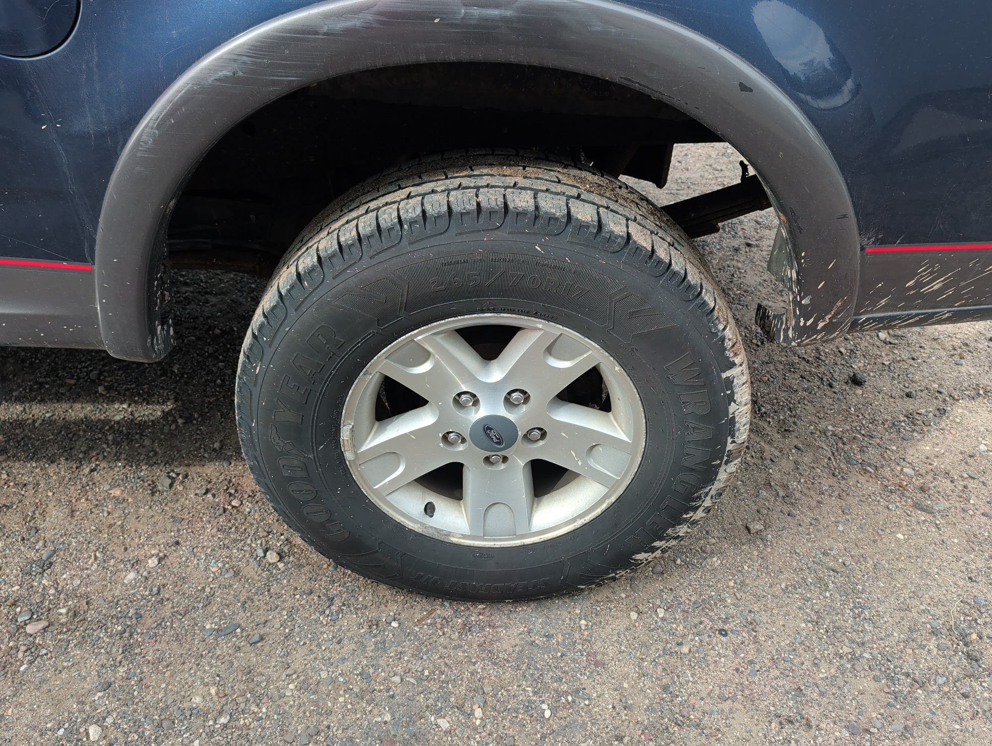 2002 ford f-150 xlt-supercrew-short-bed-4wd with 370405 miles for sale near Elk River, Minnesota 106651_13_rear_drv_wheel.jpg