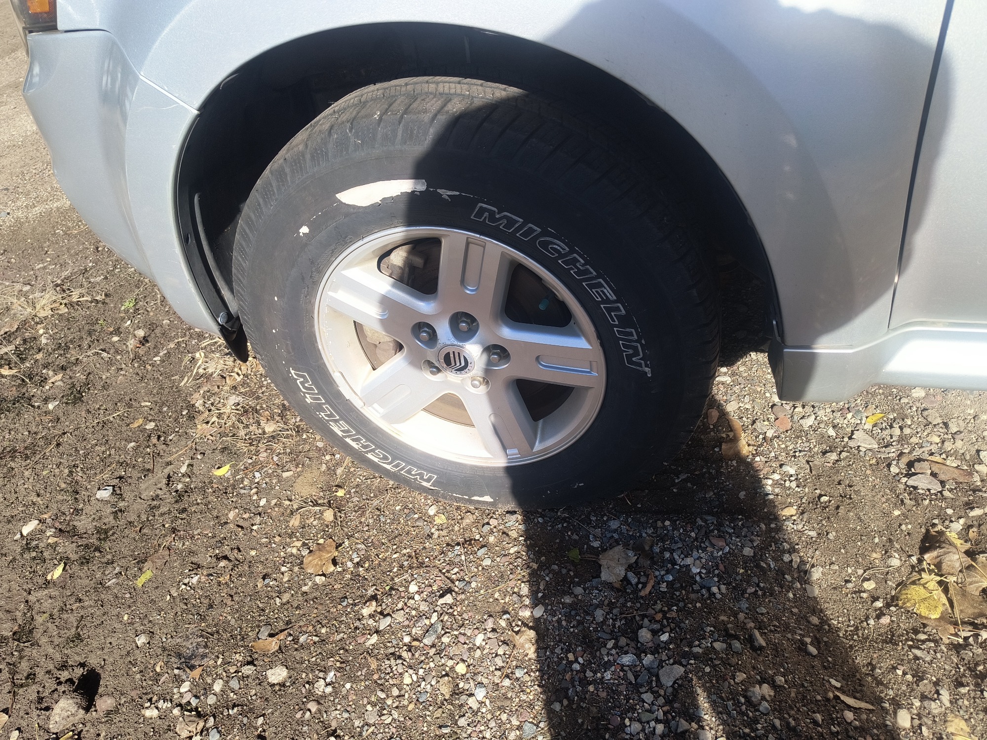 2009 mercury mariner-hybrid 4wd with 333358 miles for sale near Elk River, Minnesota 106658_12_drv_front_wheel.jpg