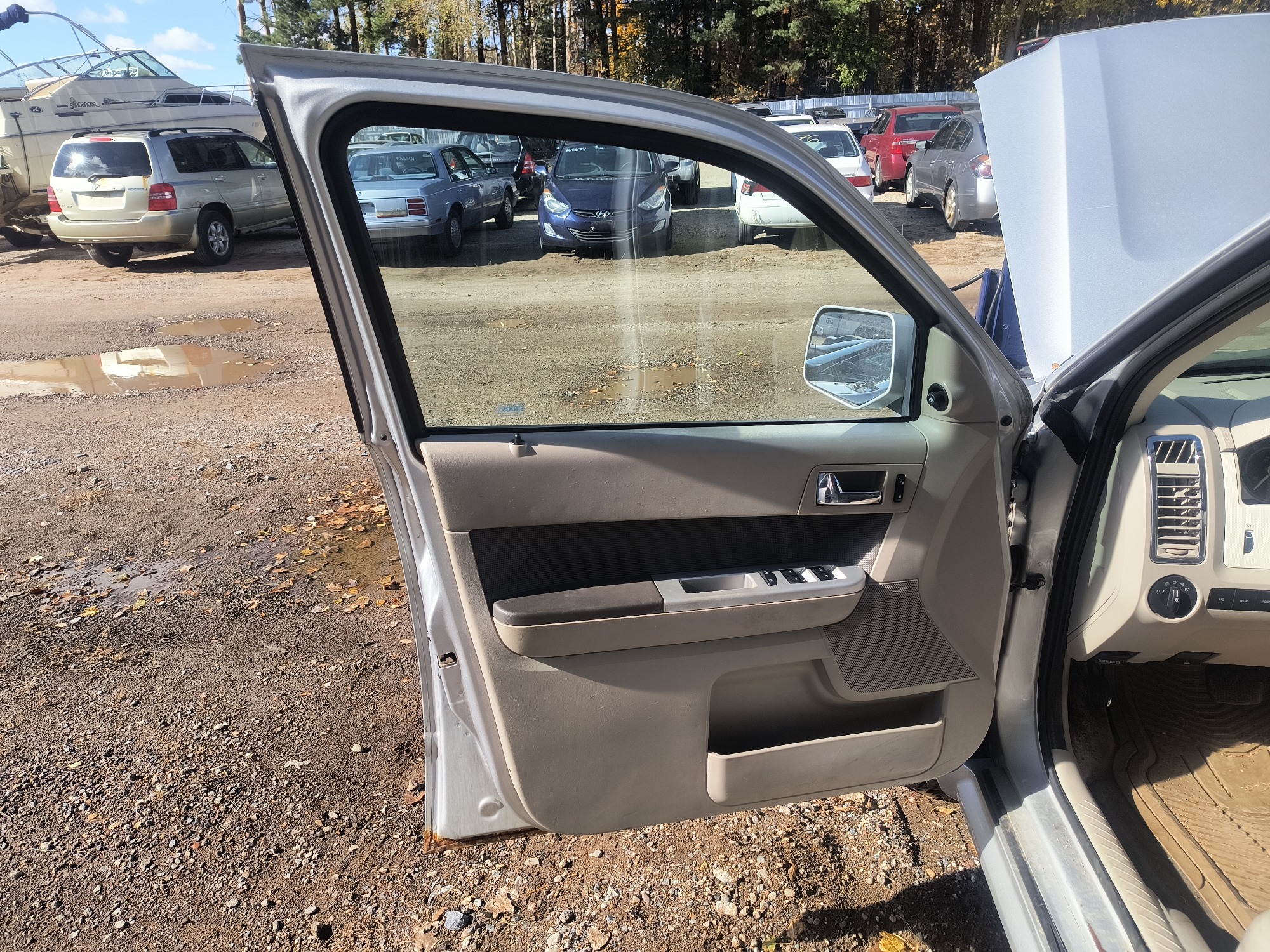 2009 mercury mariner-hybrid 4wd with 333358 miles for sale near Elk River, Minnesota 106658_23_driver_door_panel.jpg