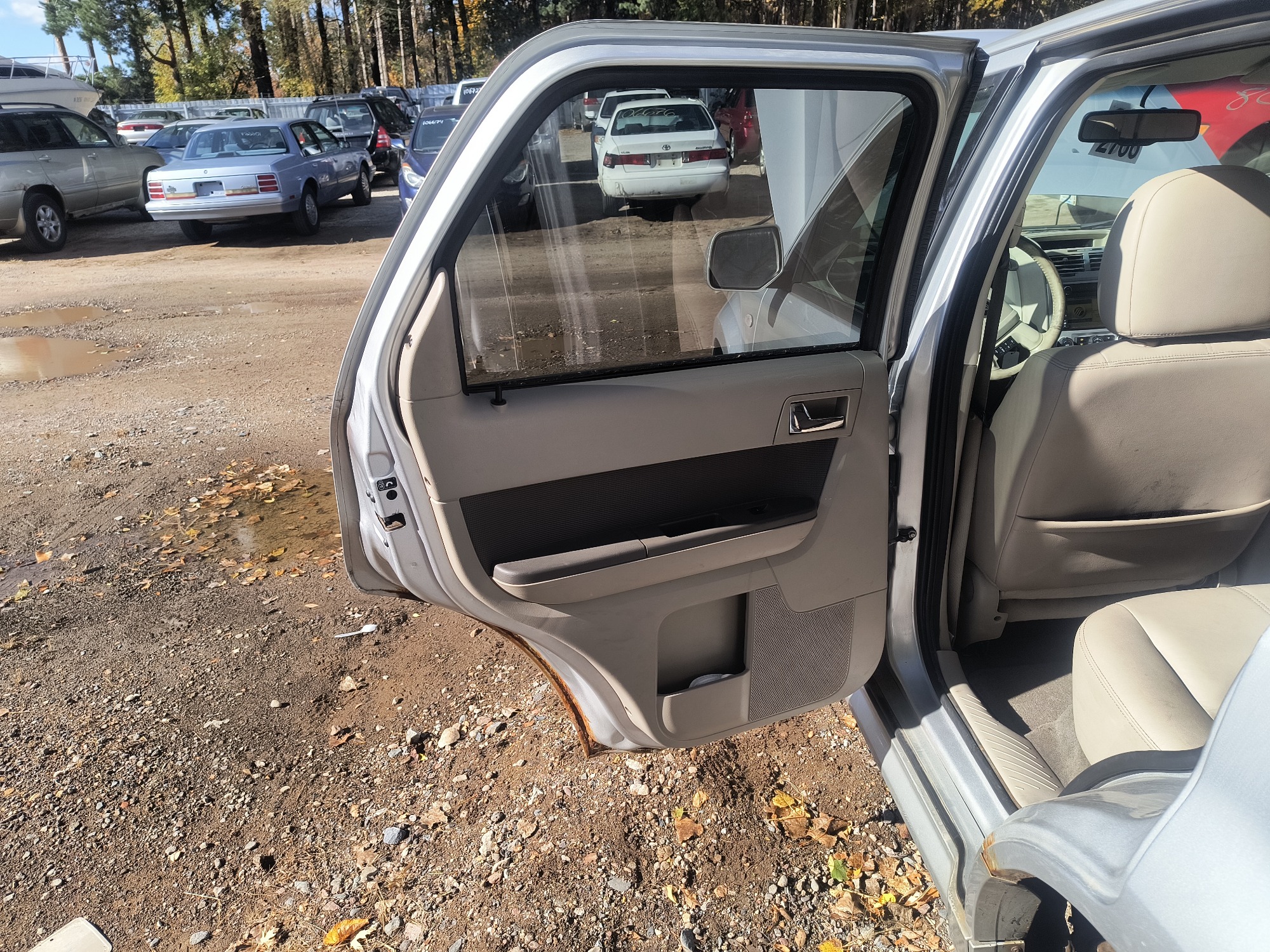 2009 mercury mariner-hybrid 4wd with 333358 miles for sale near Elk River, Minnesota 106658_25_drv_rear_door_panel.jpg