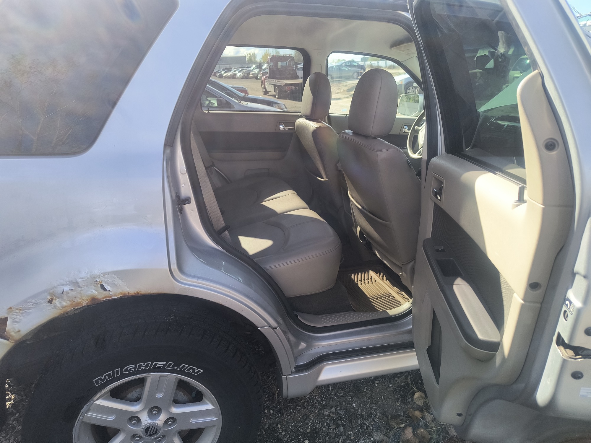 2009 mercury mariner-hybrid 4wd with 333358 miles for sale near Elk River, Minnesota 106658_28_pass_rear_seat.jpg