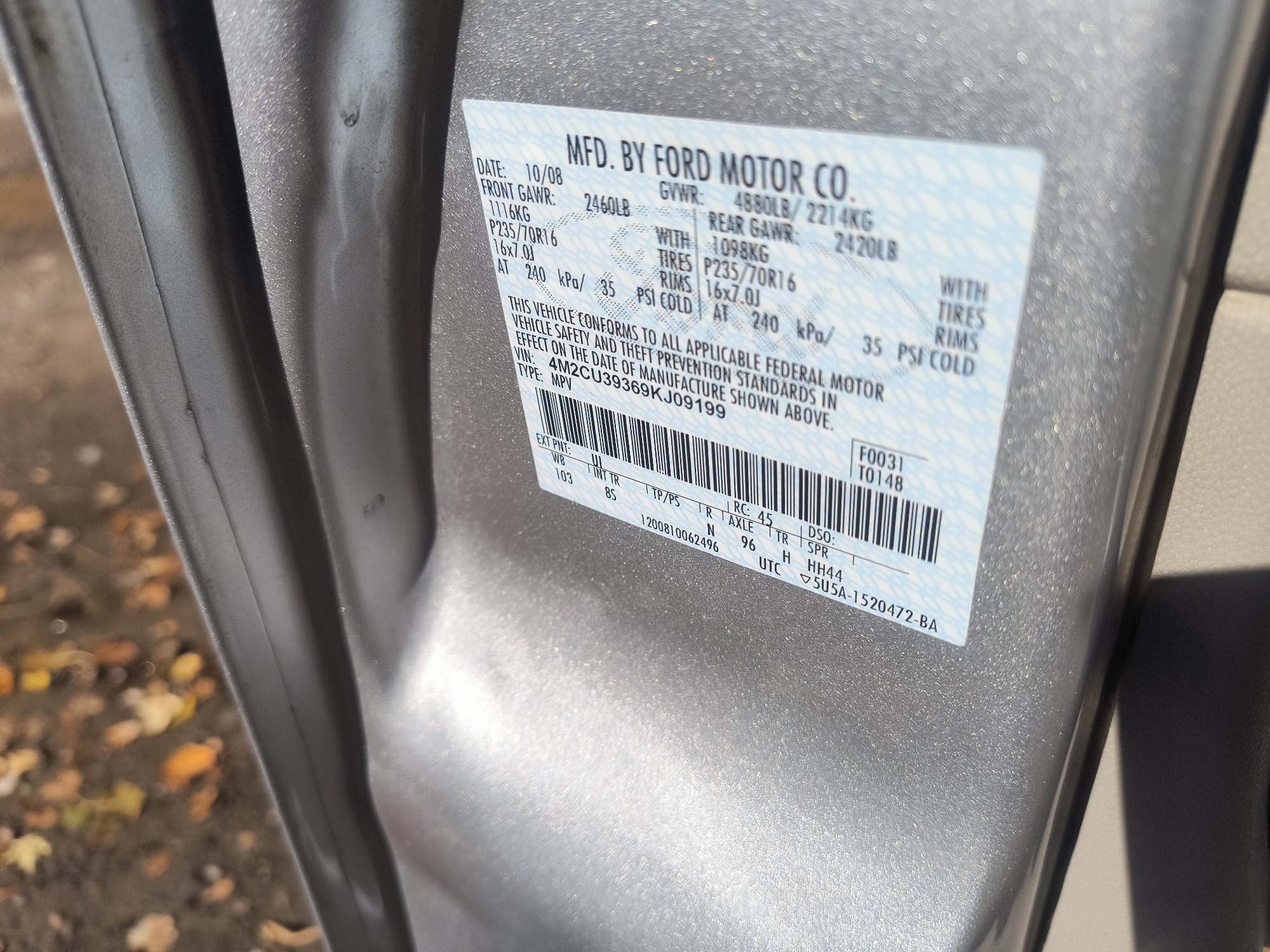 2009 mercury mariner-hybrid 4wd with 333358 miles for sale near Elk River, Minnesota 106658_47_door_vin_sticker.jpg