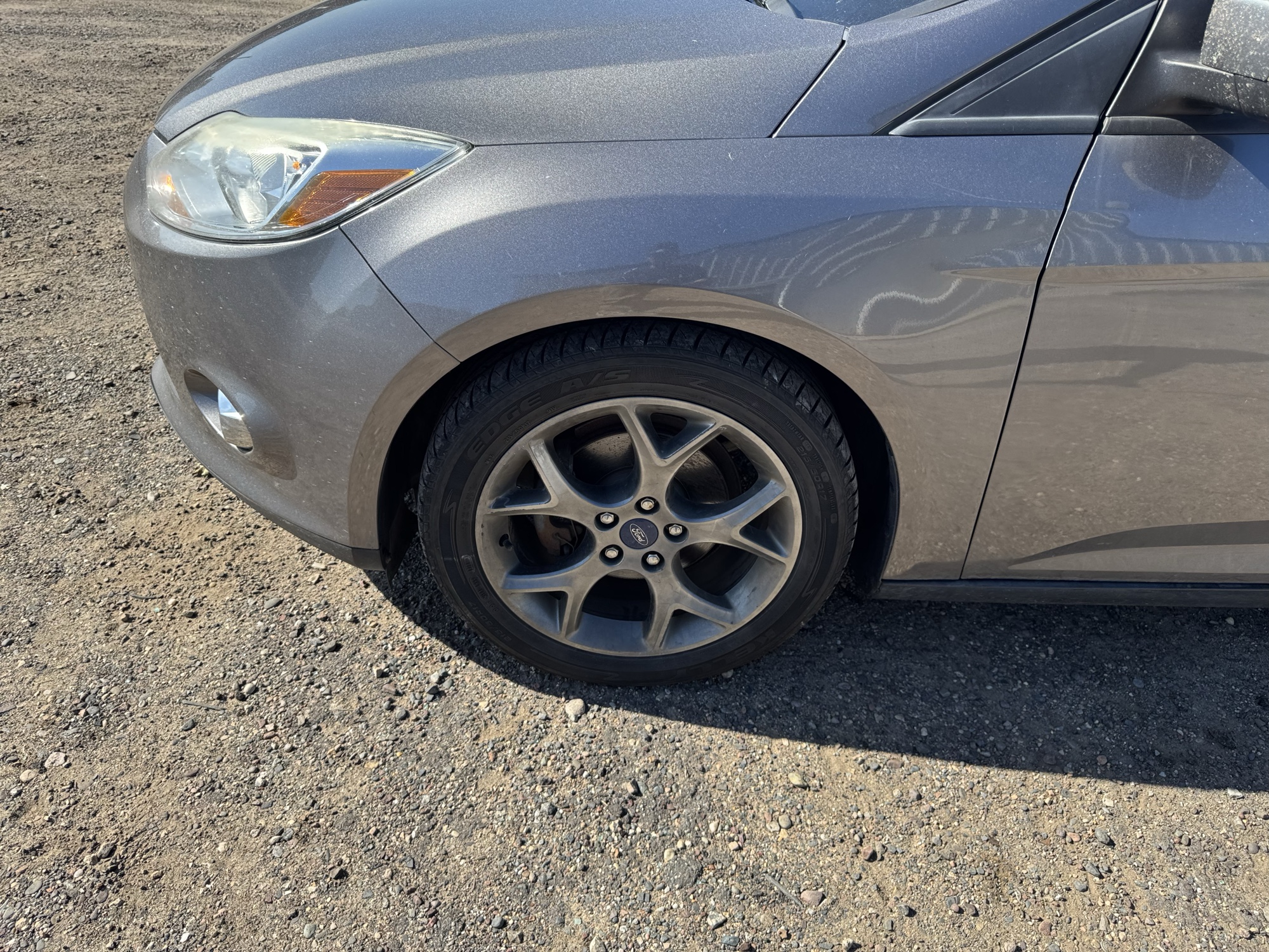 2013 ford focus se-sedan with 242471 miles for sale near Elk River, Minnesota 106659_12_drv_front_wheel.jpg