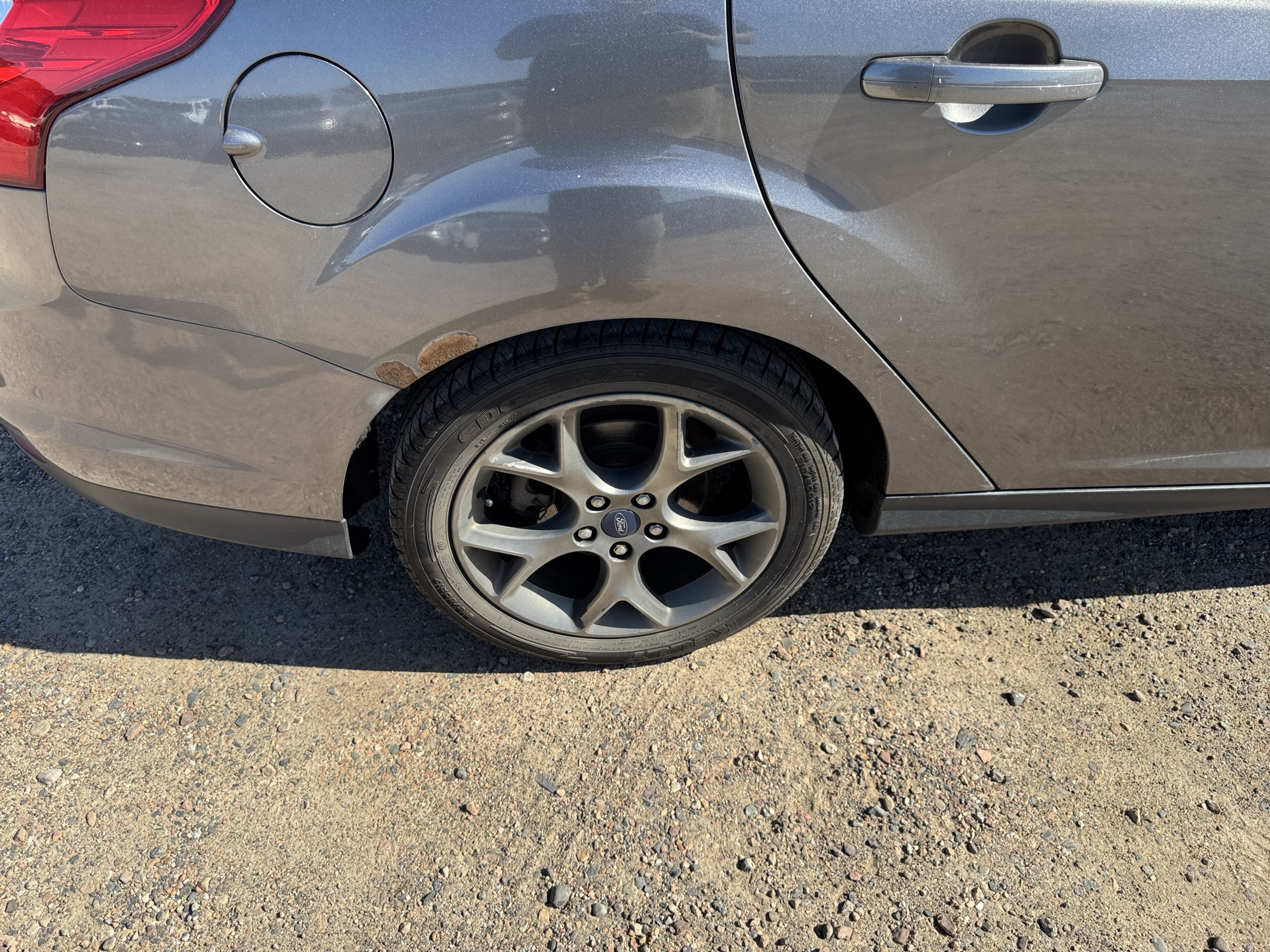 2013 ford focus se-sedan with 242471 miles for sale near Elk River, Minnesota 106659_14_rear_pass_wheel.jpg