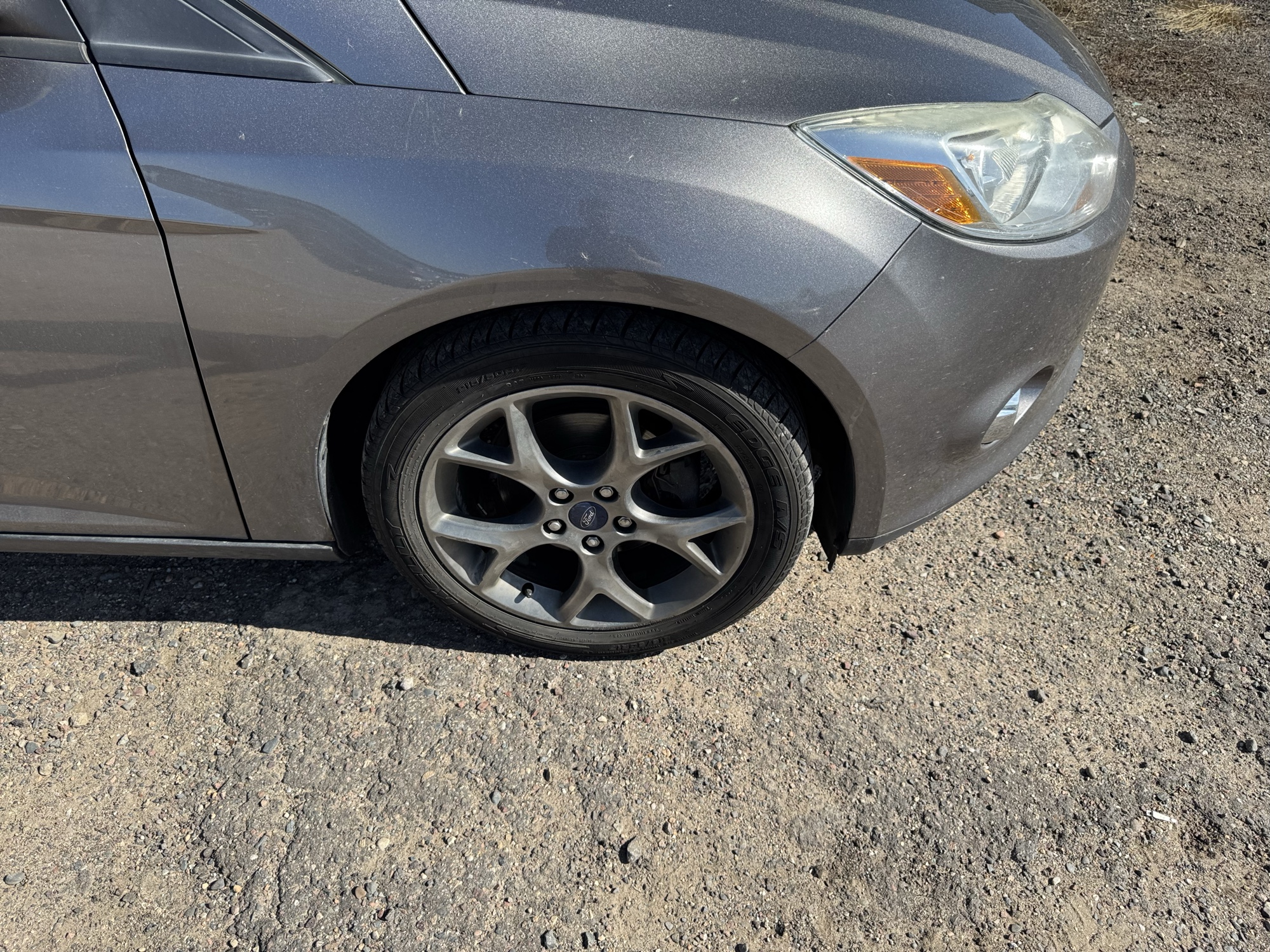 2013 ford focus se-sedan with 242471 miles for sale near Elk River, Minnesota 106659_15_front_pass_wheel.jpg
