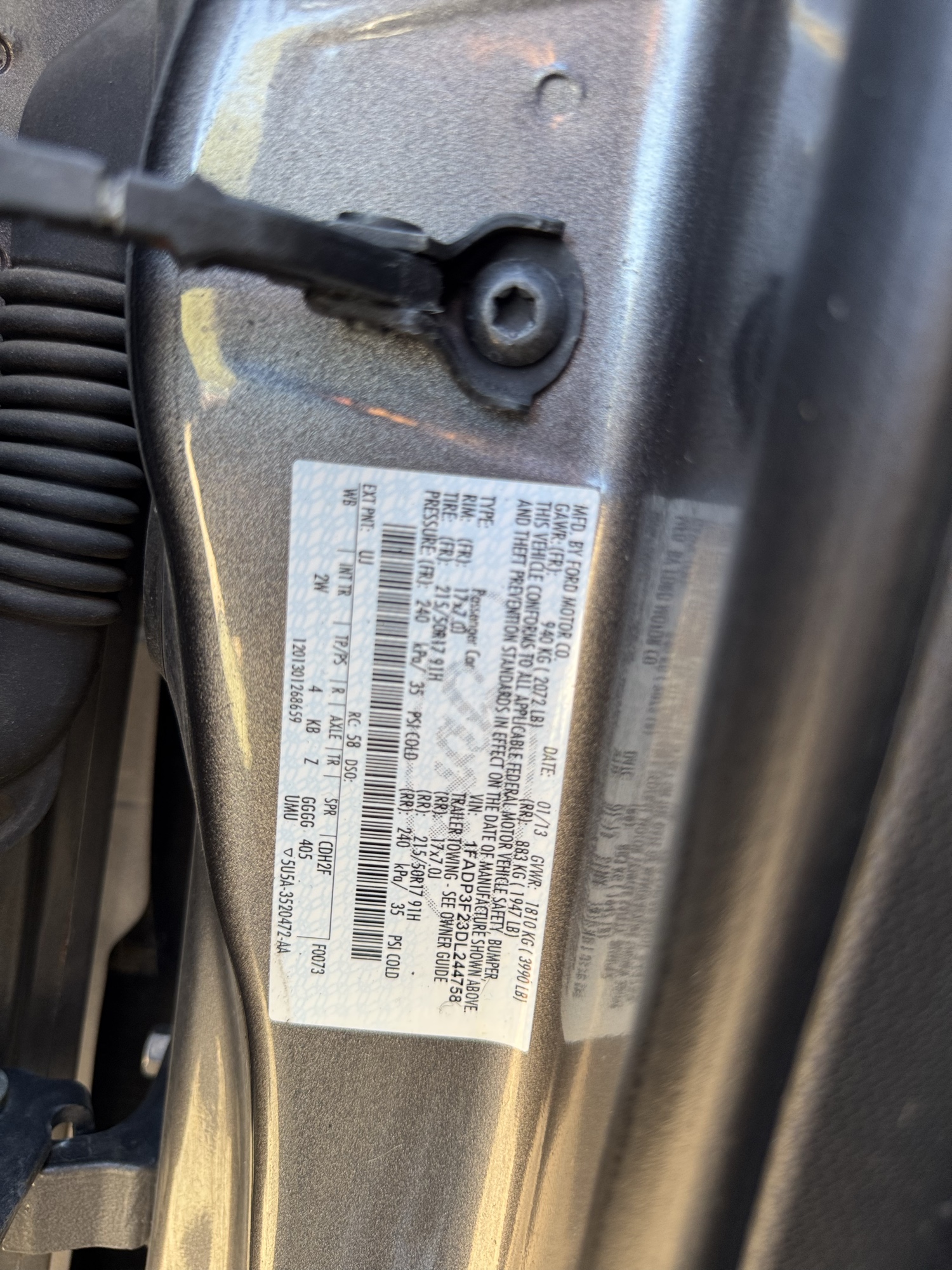 2013 ford focus se-sedan with 242471 miles for sale near Elk River, Minnesota 106659_47_door_vin_sticker.jpg