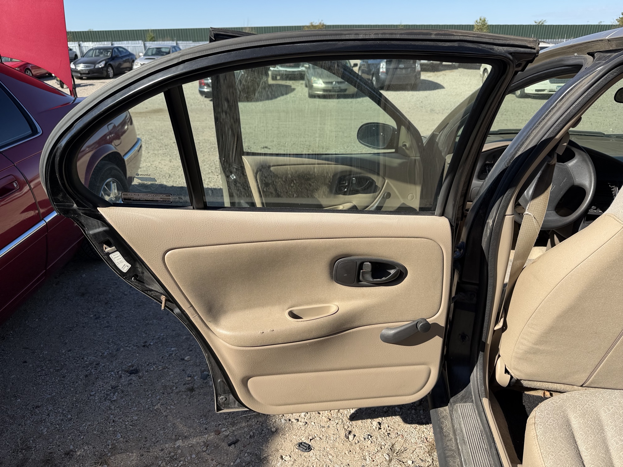 2002 saturn sl sl1 with 170974 miles for sale near Elk River, Minnesota 106660_25_drv_rear_door_panel.jpg