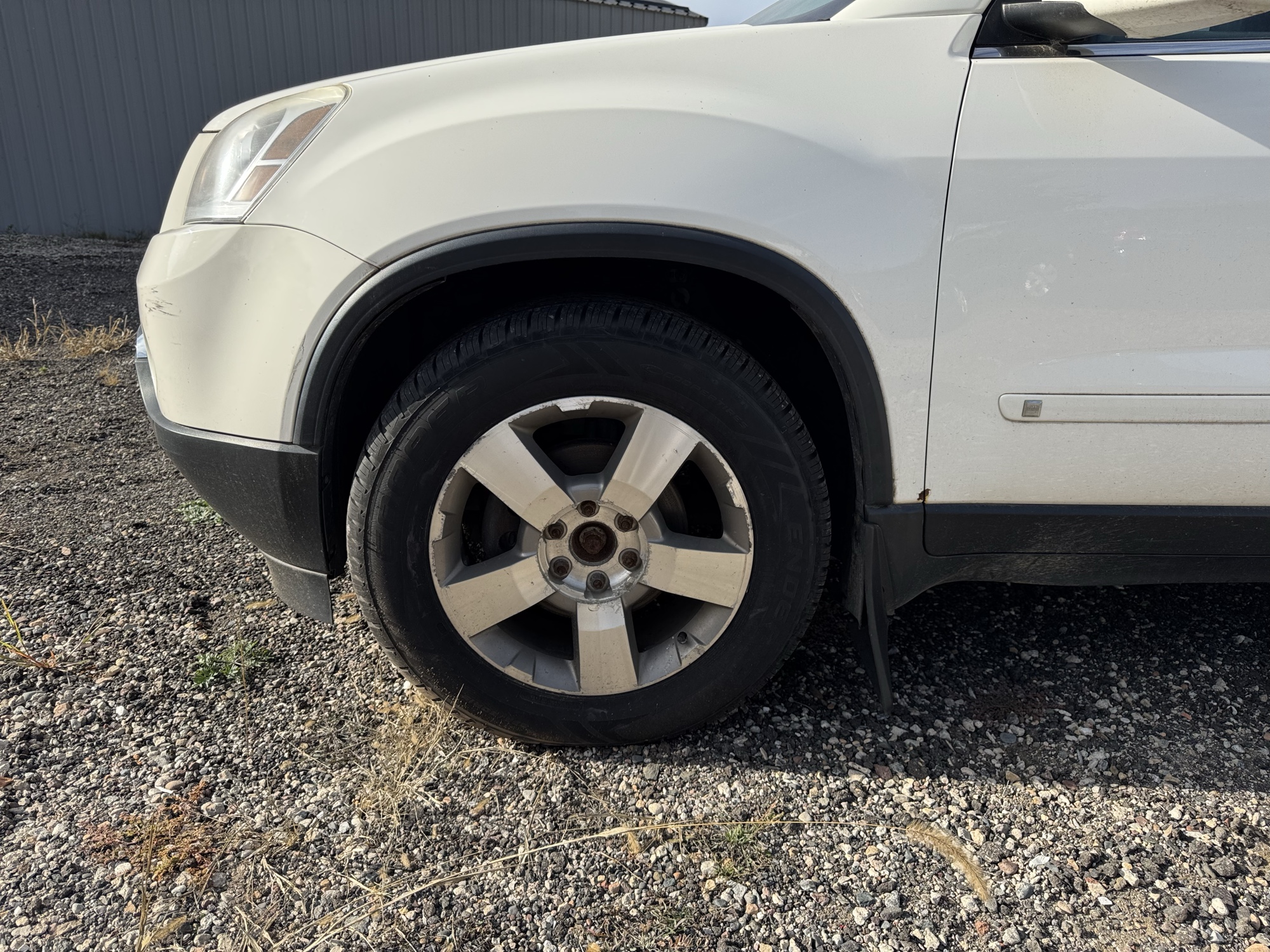 2010 gmc acadia slt-1-awd with 367138 miles for sale near Elk River, Minnesota 106661_12_drv_front_wheel.jpg