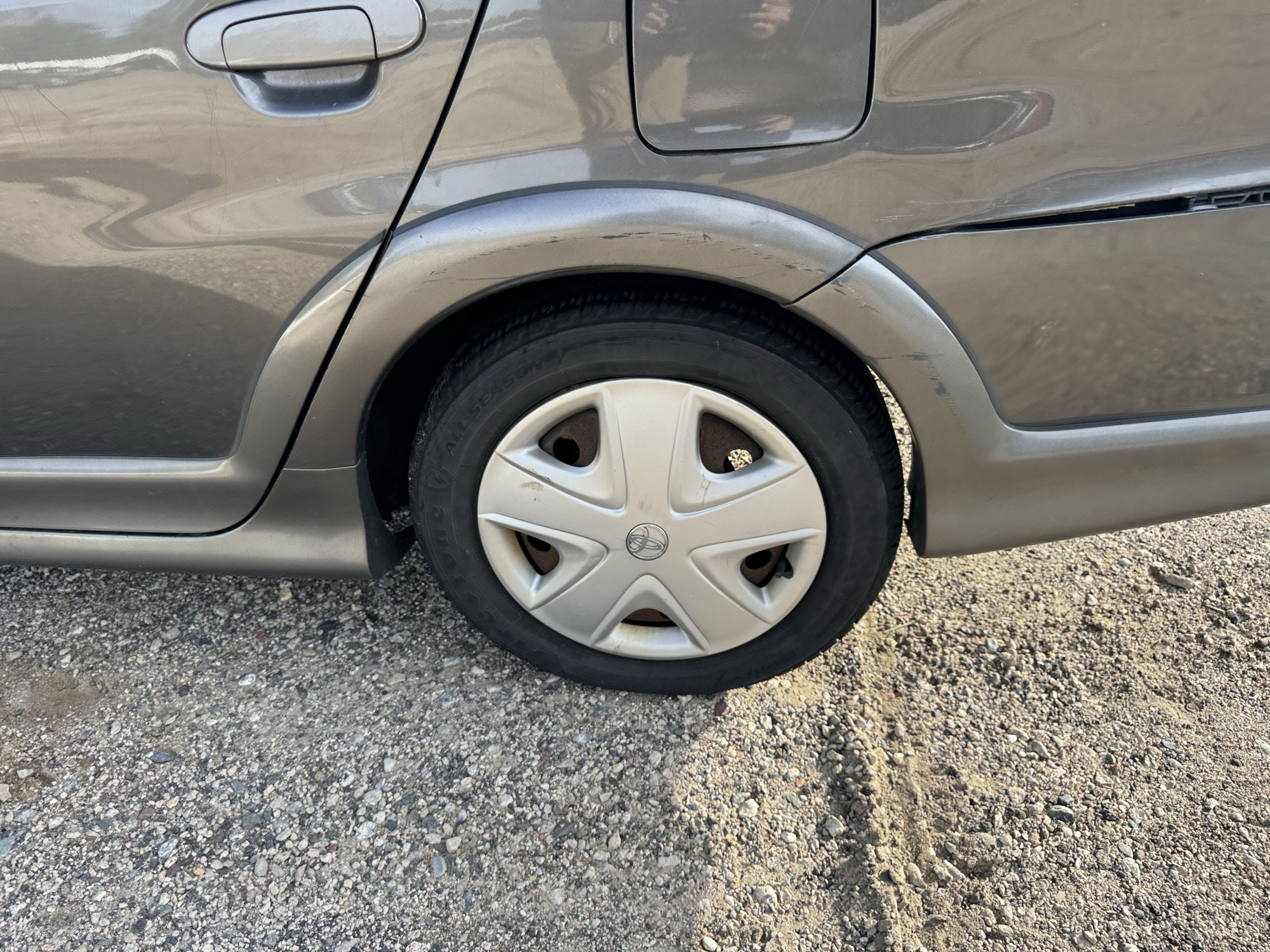 2003 toyota echo 4-door-sedan with 222883 miles for sale near Elk River, Minnesota 106664_13_rear_drv_wheel.jpg