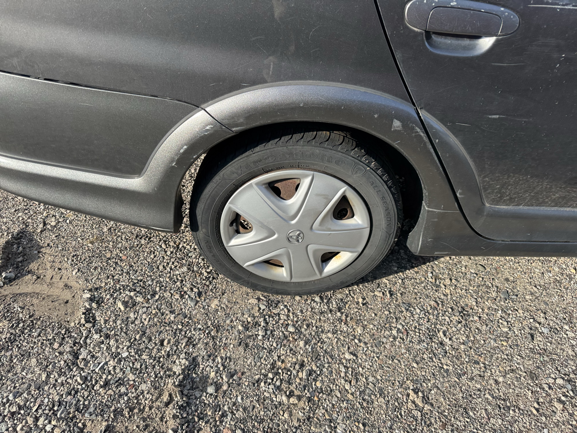2003 toyota echo 4-door-sedan with 222883 miles for sale near Elk River, Minnesota 106664_14_rear_pass_wheel.jpg