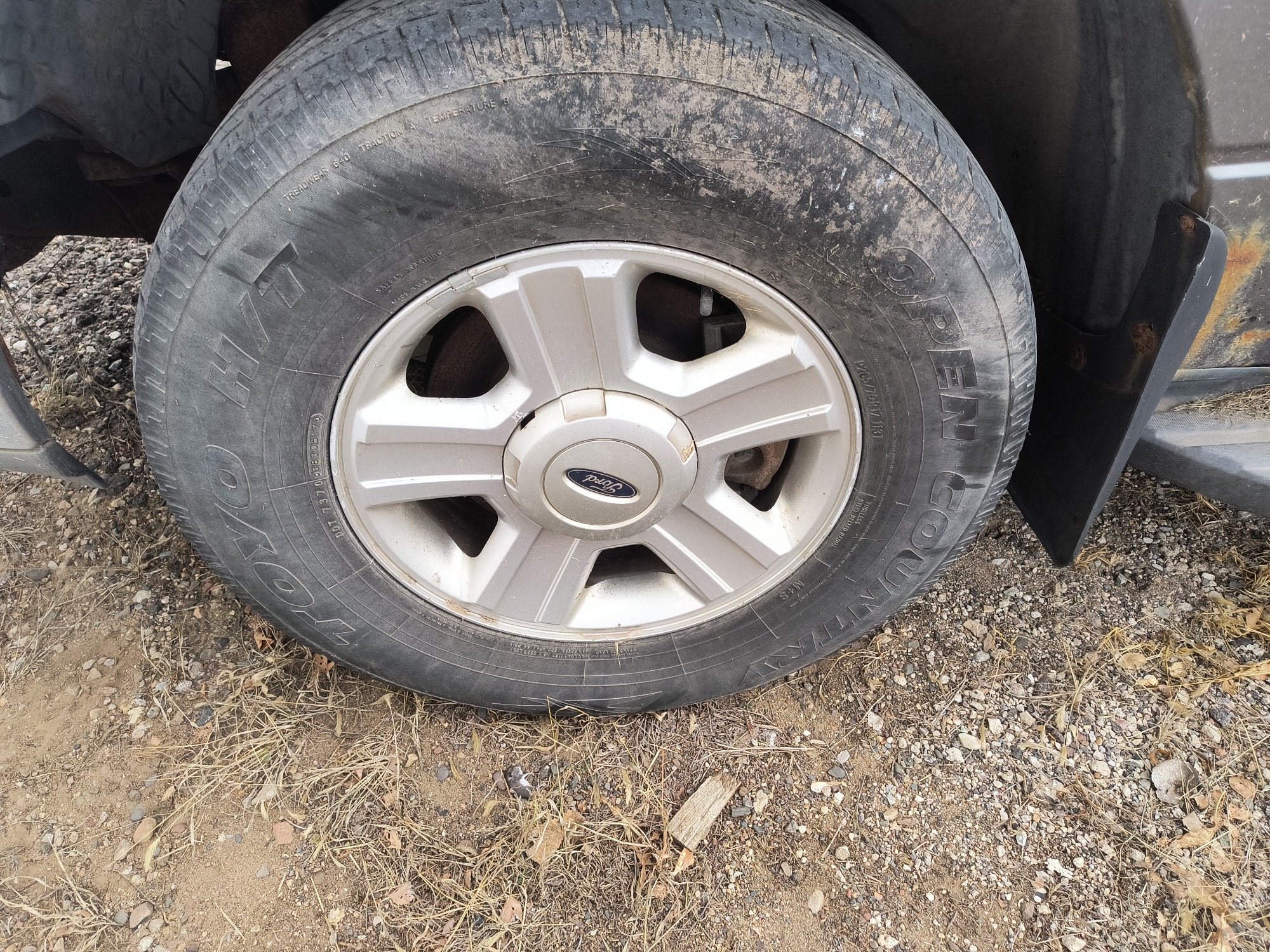2004 ford f-150 xl-supercab-4wd with 217438 miles for sale near Elk River, Minnesota 106666_12_drv_front_wheel.jpg