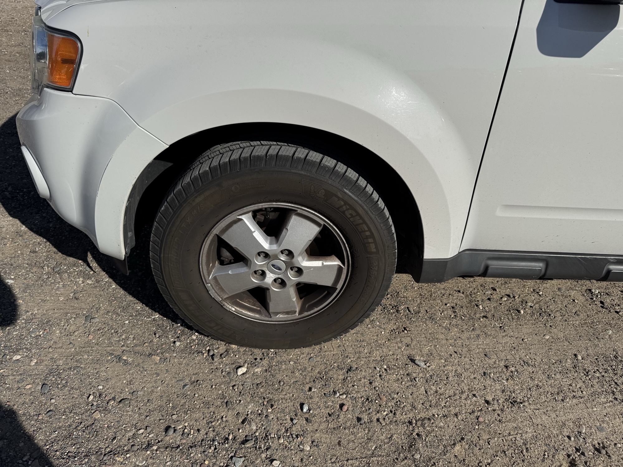 2009 ford escape xlt-fwd-v6 with 165967 miles for sale near Elk River, Minnesota 106684_12_drv_front_wheel.jpg