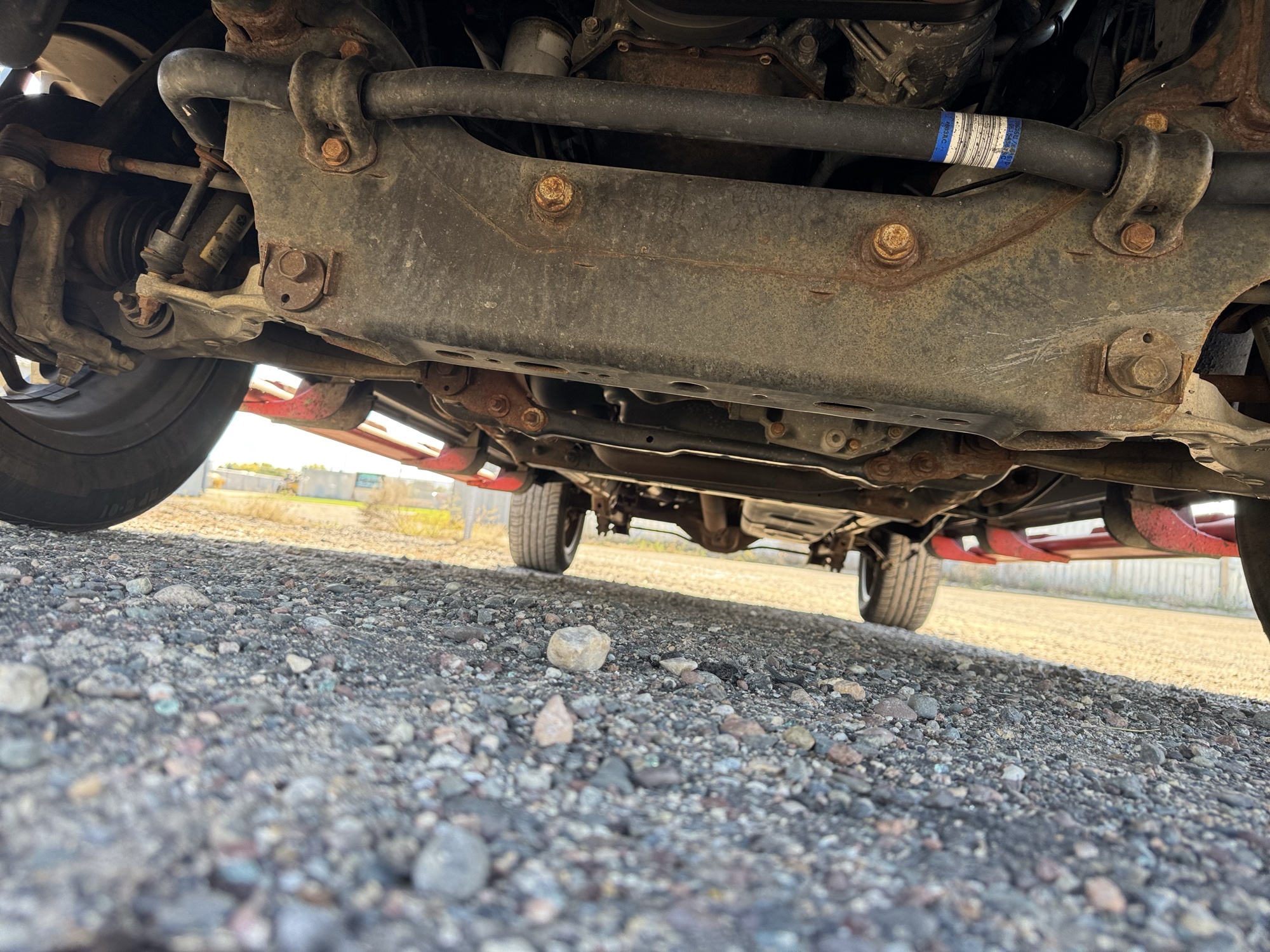 2014 ram 1500 tradesman-quad-cab-4wd with 109498 miles for sale near Elk River, Minnesota 106687_16_undercar_front.jpg