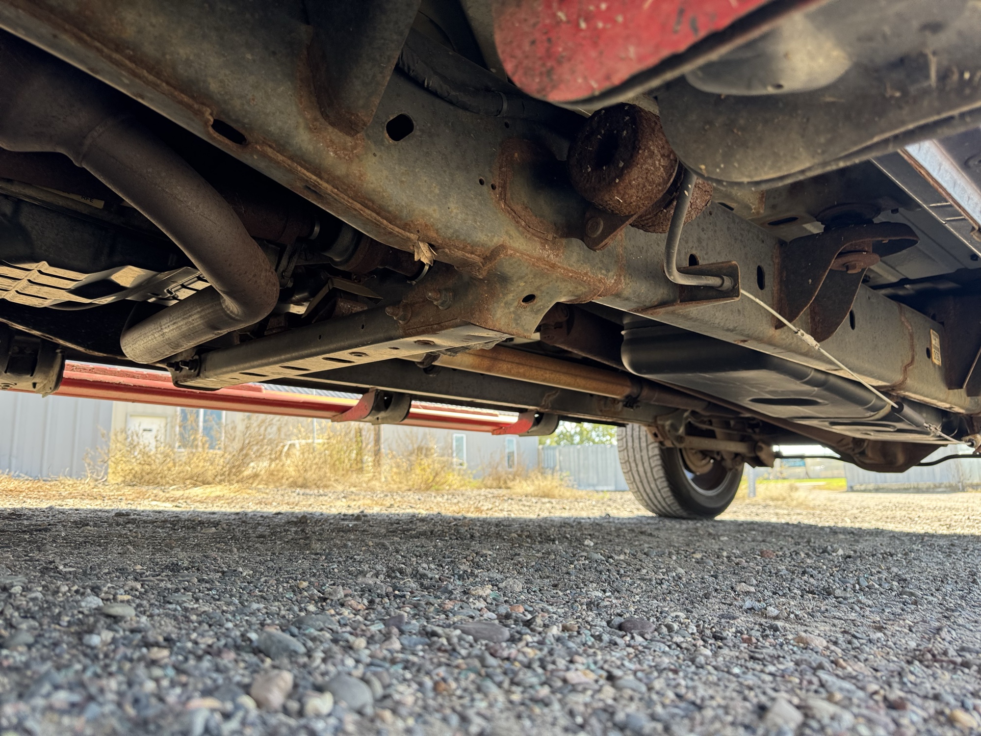 2014 ram 1500 tradesman-quad-cab-4wd with 109498 miles for sale near Elk River, Minnesota 106687_17_undercar_drv_side.jpg