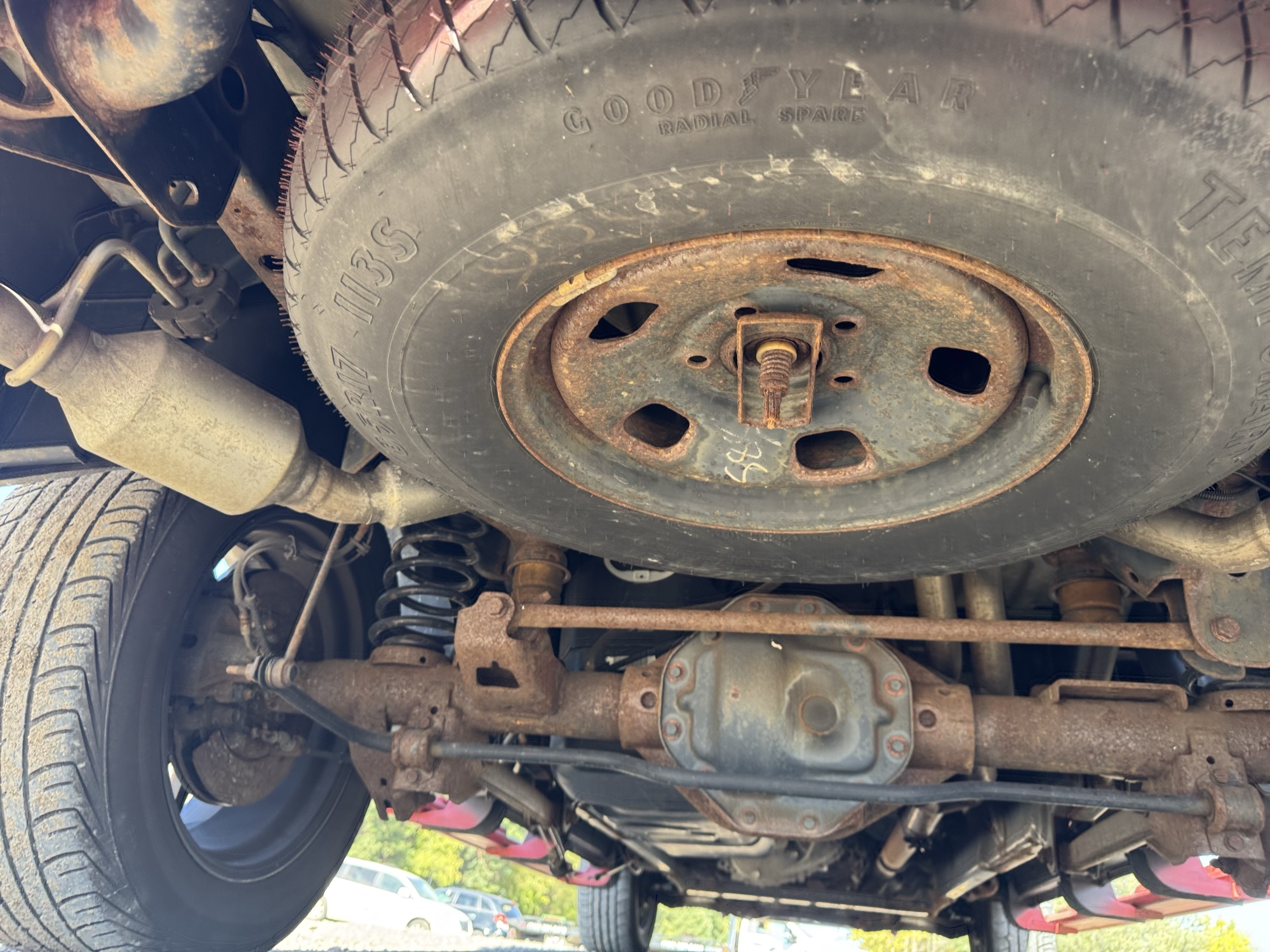 2014 ram 1500 tradesman-quad-cab-4wd with 109498 miles for sale near Elk River, Minnesota 106687_27_spare_tire.jpg