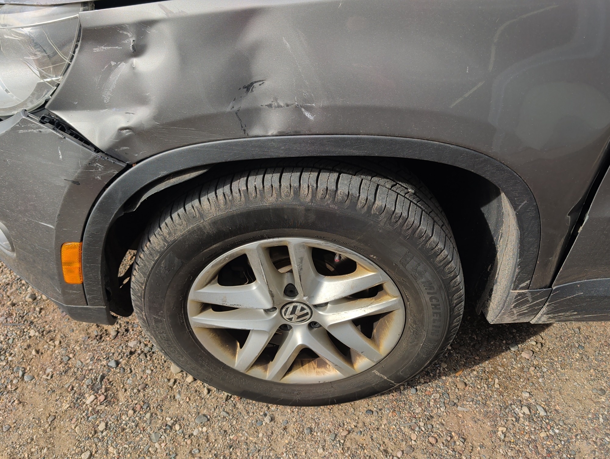 2011 volkswagen tiguan s with 149749 miles for sale near Elk River, Minnesota 106692_12_drv_front_wheel.jpg