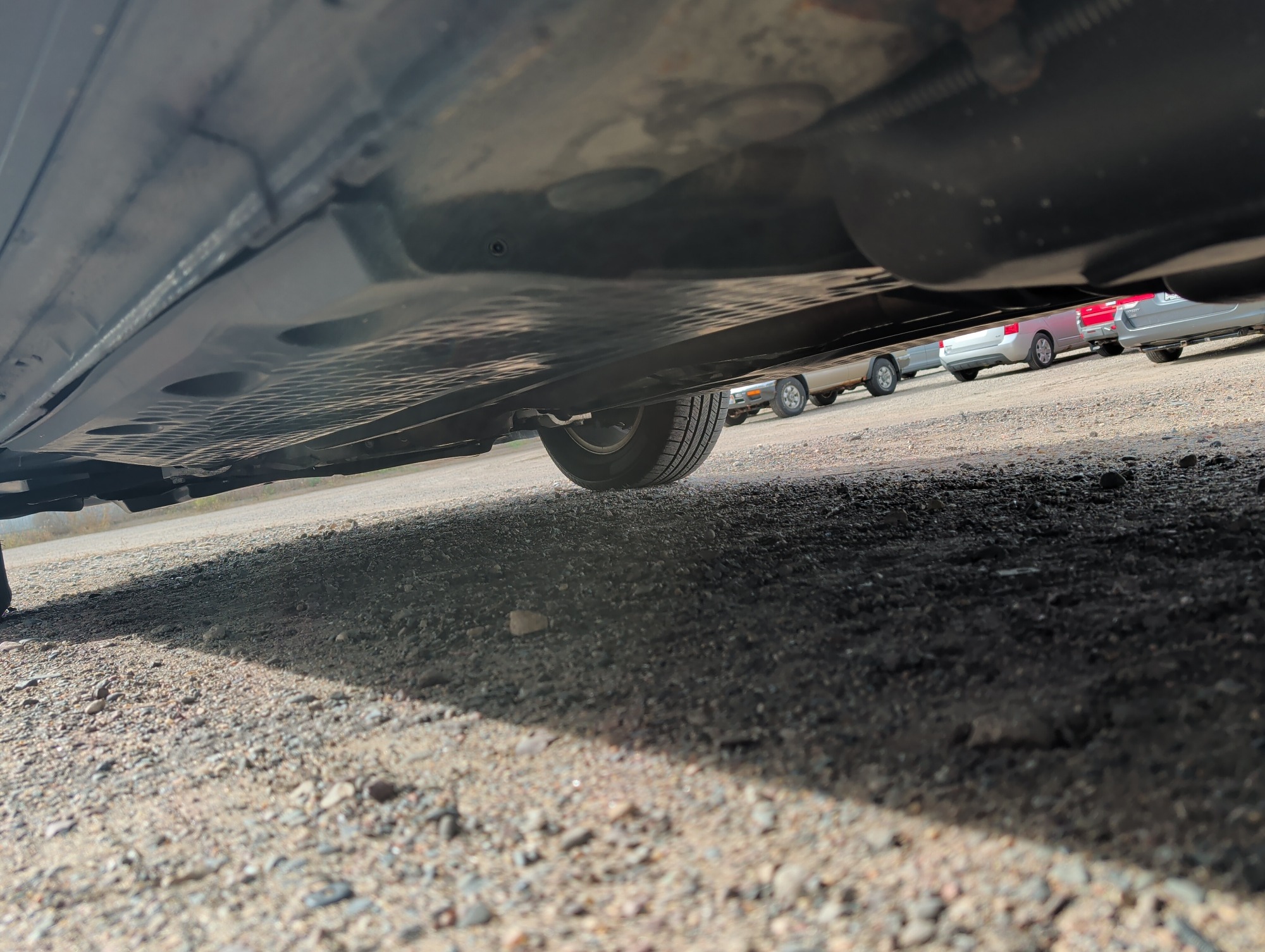 2011 volkswagen tiguan s with 149749 miles for sale near Elk River, Minnesota 106692_18_undercar_rear_drv.jpg