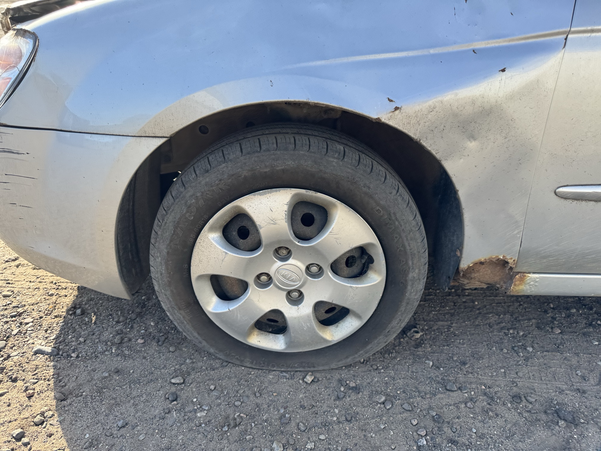 2007 kia spectra lx with 188719 miles for sale near Elk River, Minnesota 106695_12_drv_front_wheel.jpg