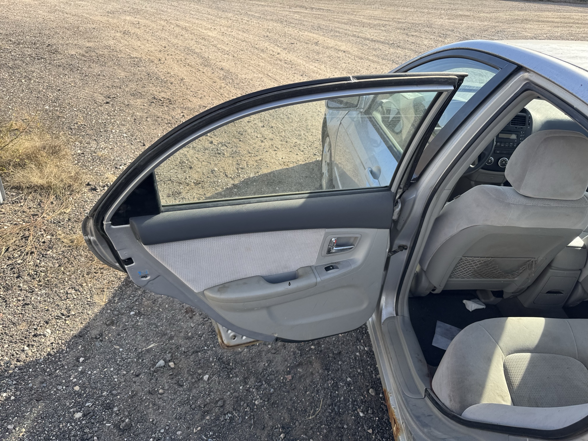 2007 kia spectra lx with 188719 miles for sale near Elk River, Minnesota 106695_25_drv_rear_door_panel.jpg