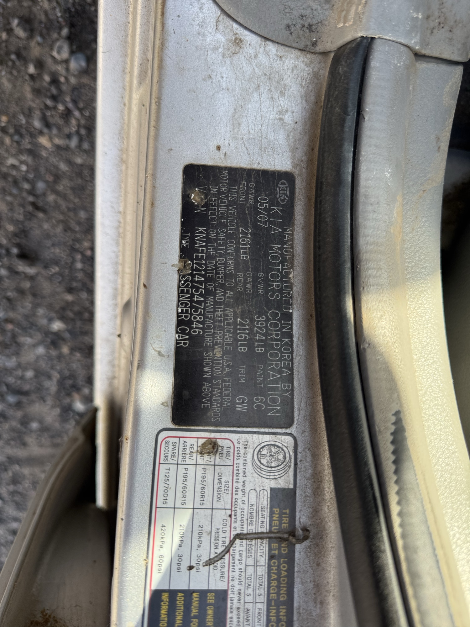 2007 kia spectra lx with 188719 miles for sale near Elk River, Minnesota 106695_47_door_vin_sticker.jpg