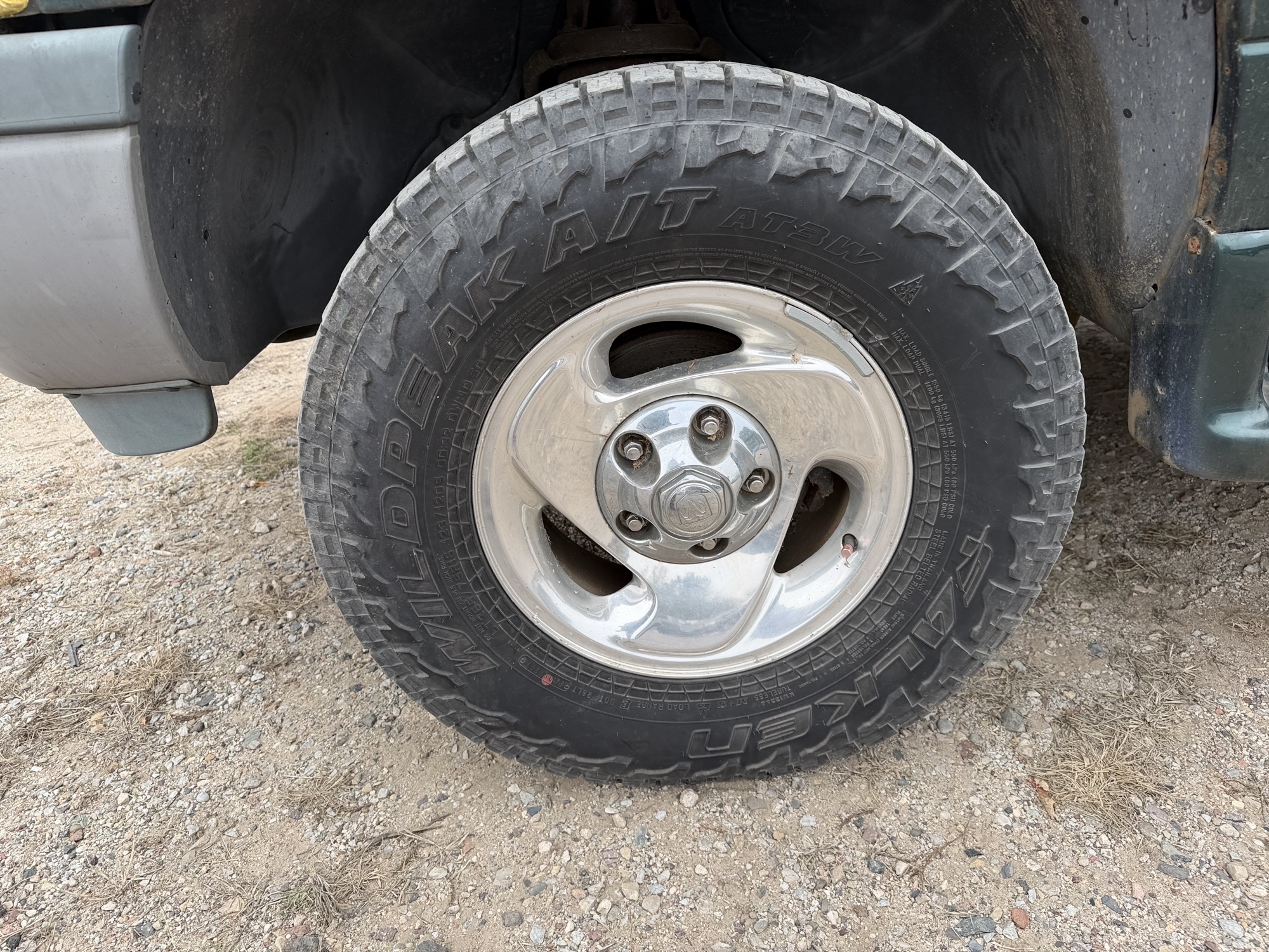 1998 dodge ram-1500 quad-cab-8-ft.-bed-4wd with 133361 miles for sale near Elk River, Minnesota 106699_12_drv_front_wheel.jpg