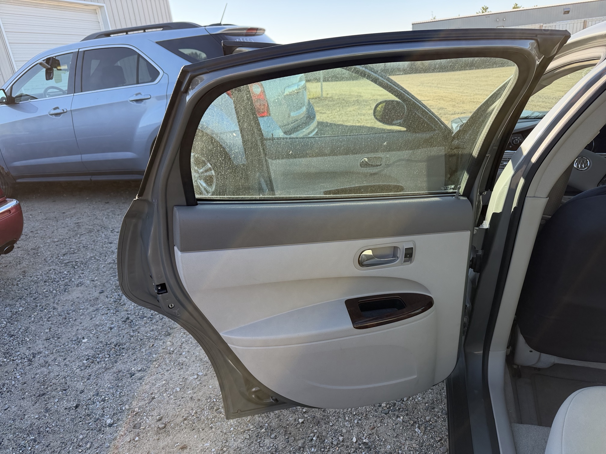 2009 buick lacrosse cx with 28748 miles for sale near Elk River, Minnesota 106702_25_drv_rear_door_panel.jpg